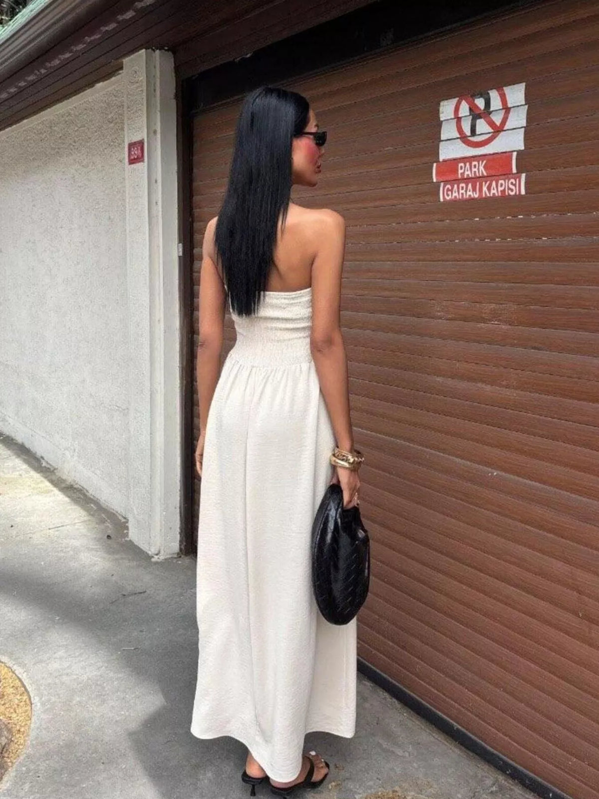 Strapless smocked maxi dress close up view