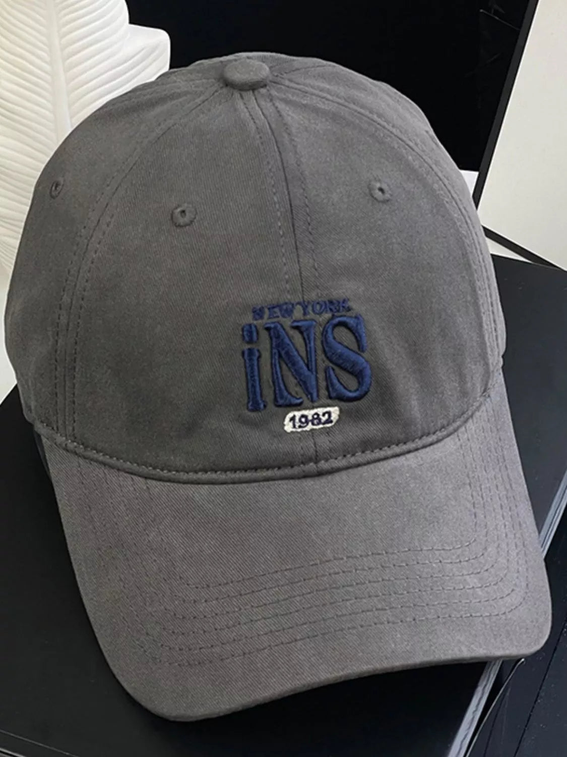 Embroidered baseball cap shown in wine red