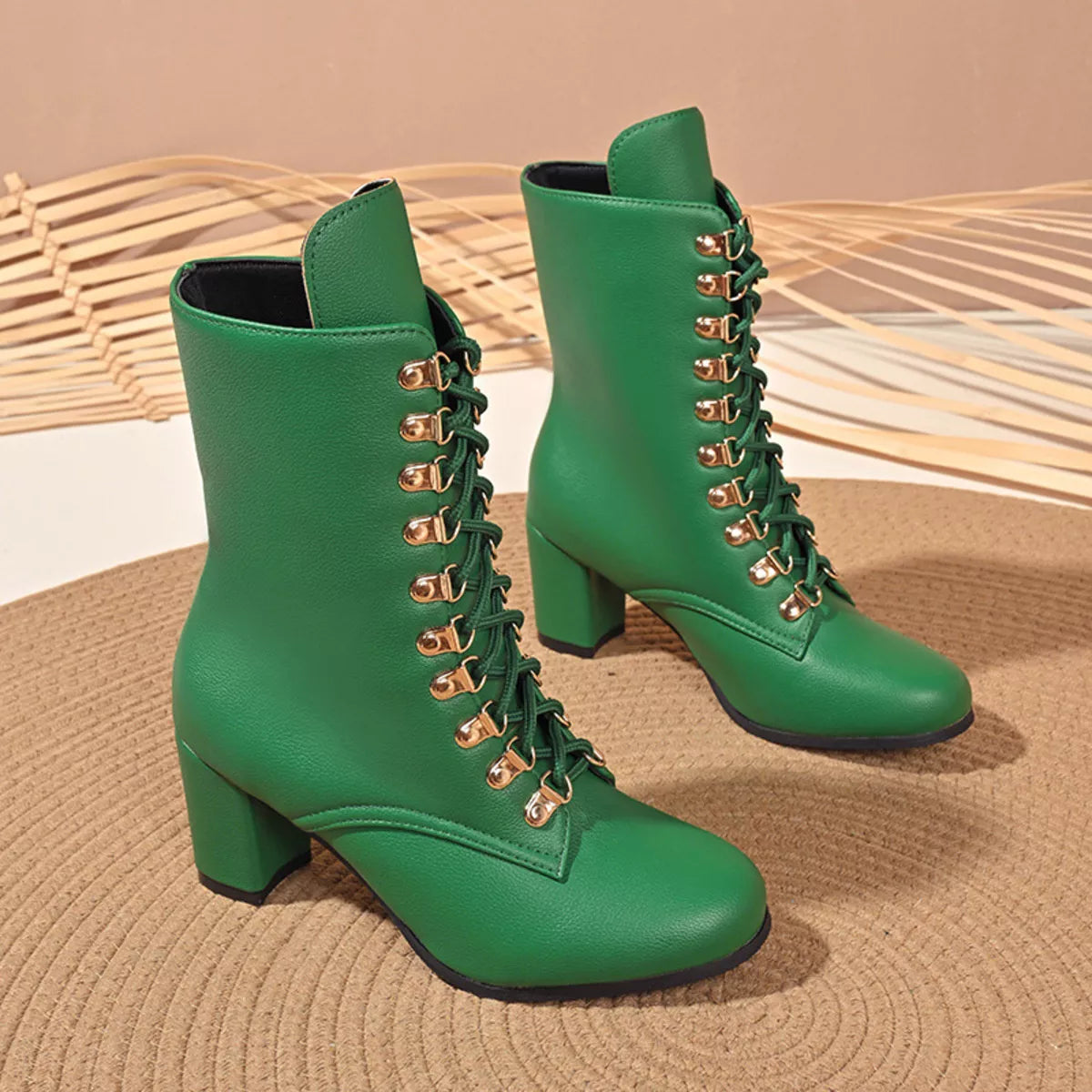 Lace up block heel boots close up detail