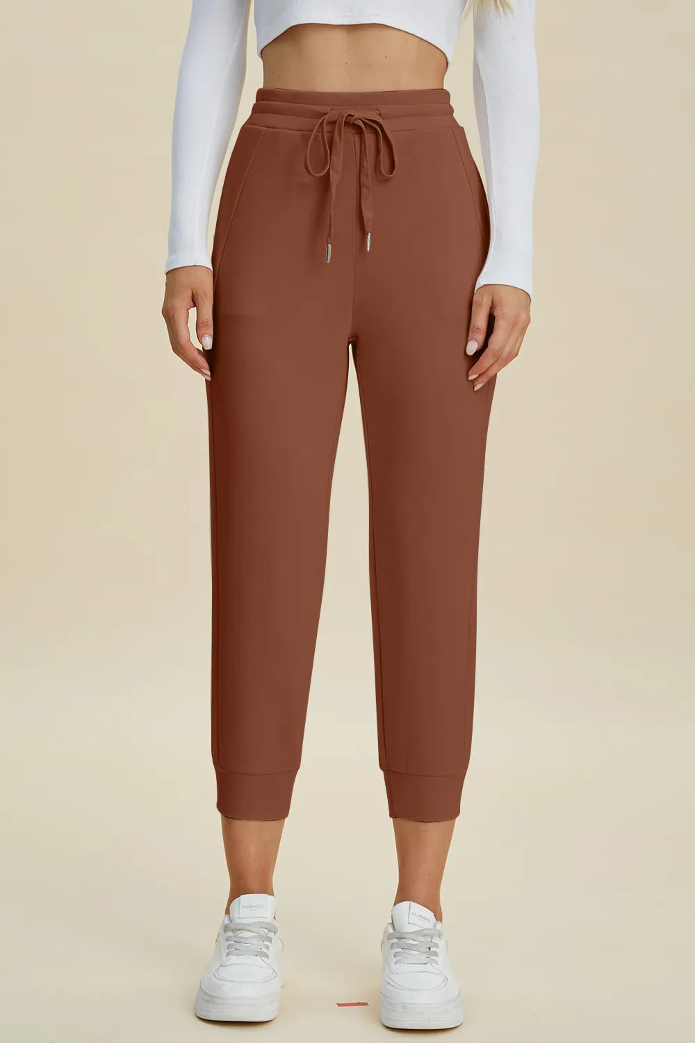 Drawstring high waist pants angled styling view
