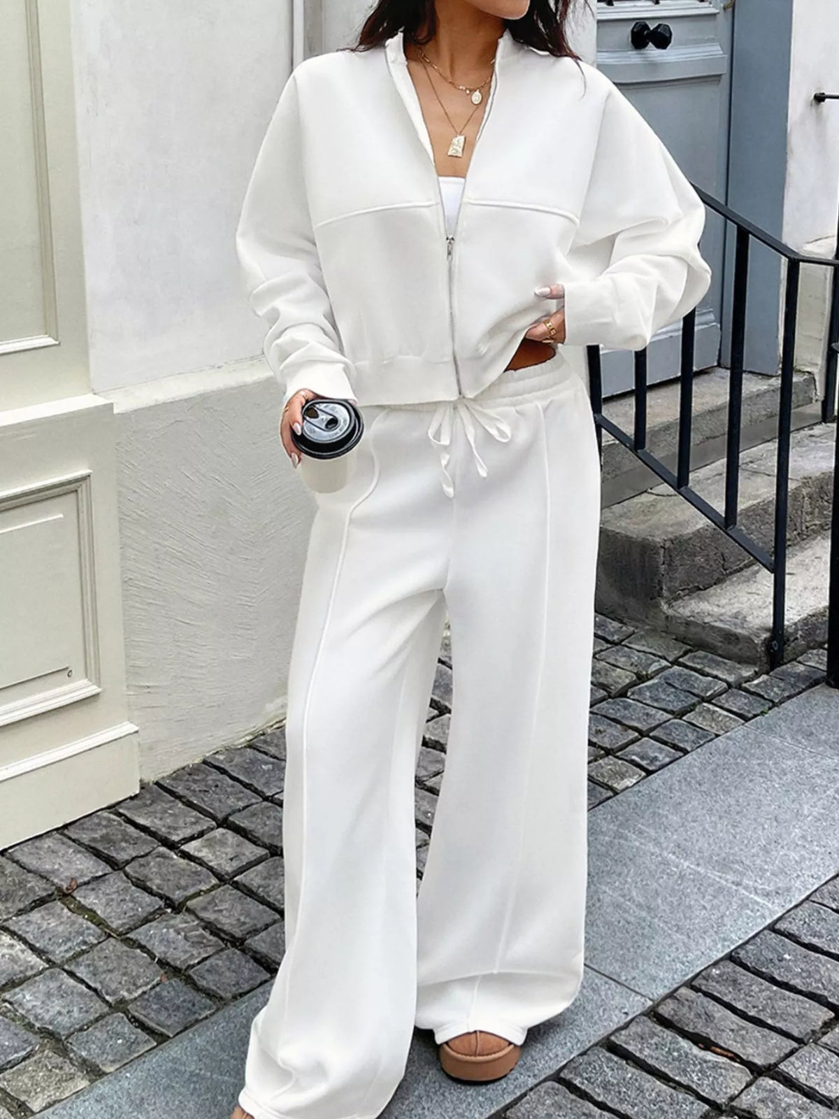 White zip up jacket and pants set front view