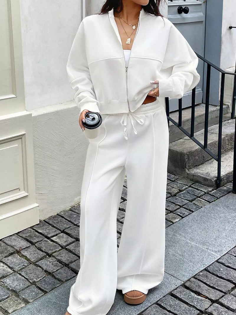White zip up jacket and pants set front view