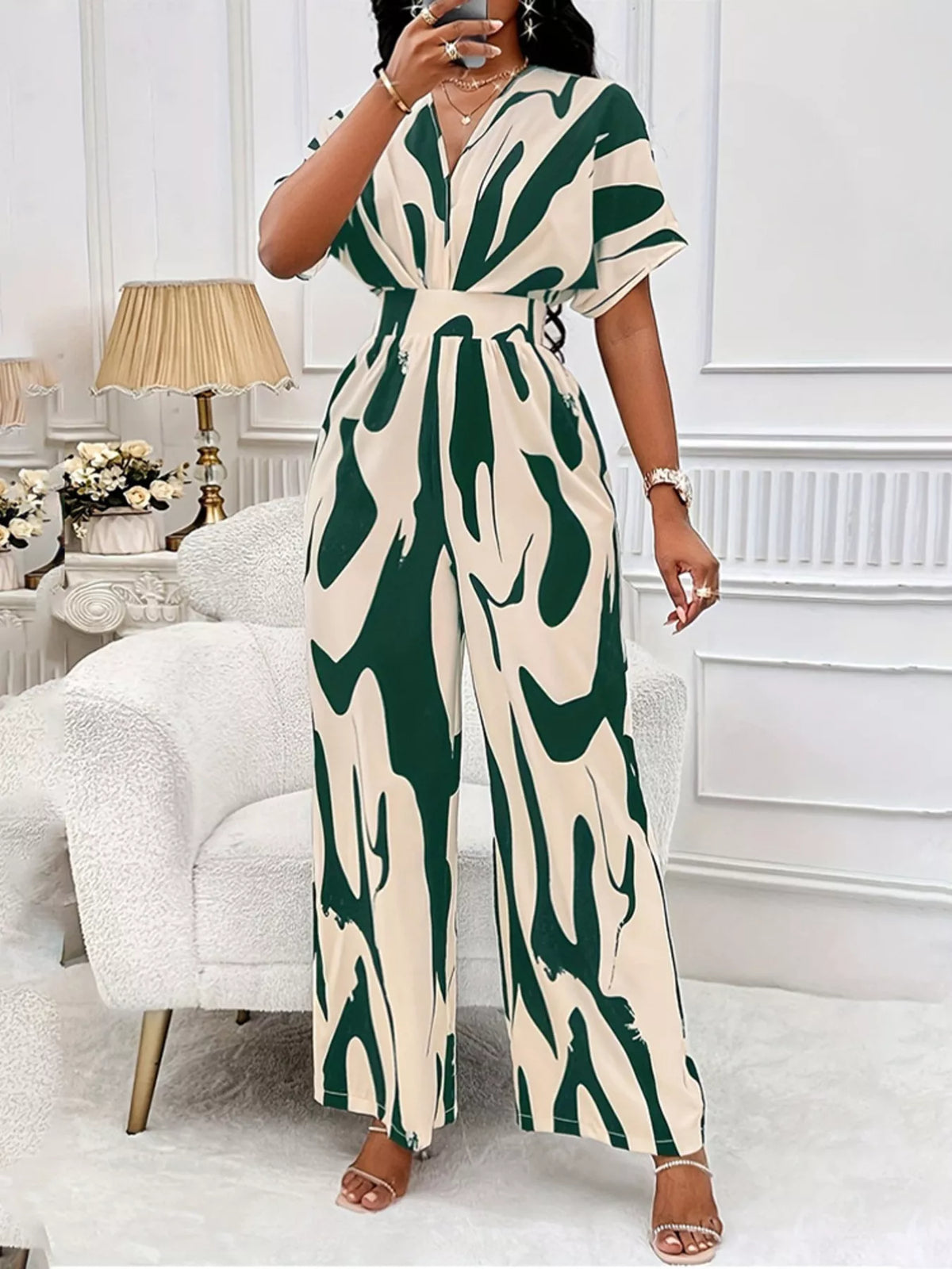 Abstract print wide leg jumpsuit with ruched bodice detail view