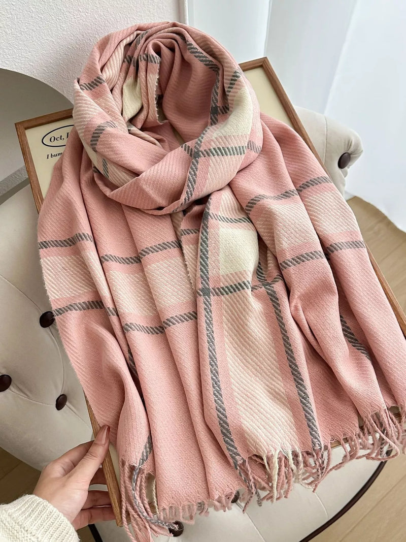 Classic plaid tassel winter scarf draped over a coat