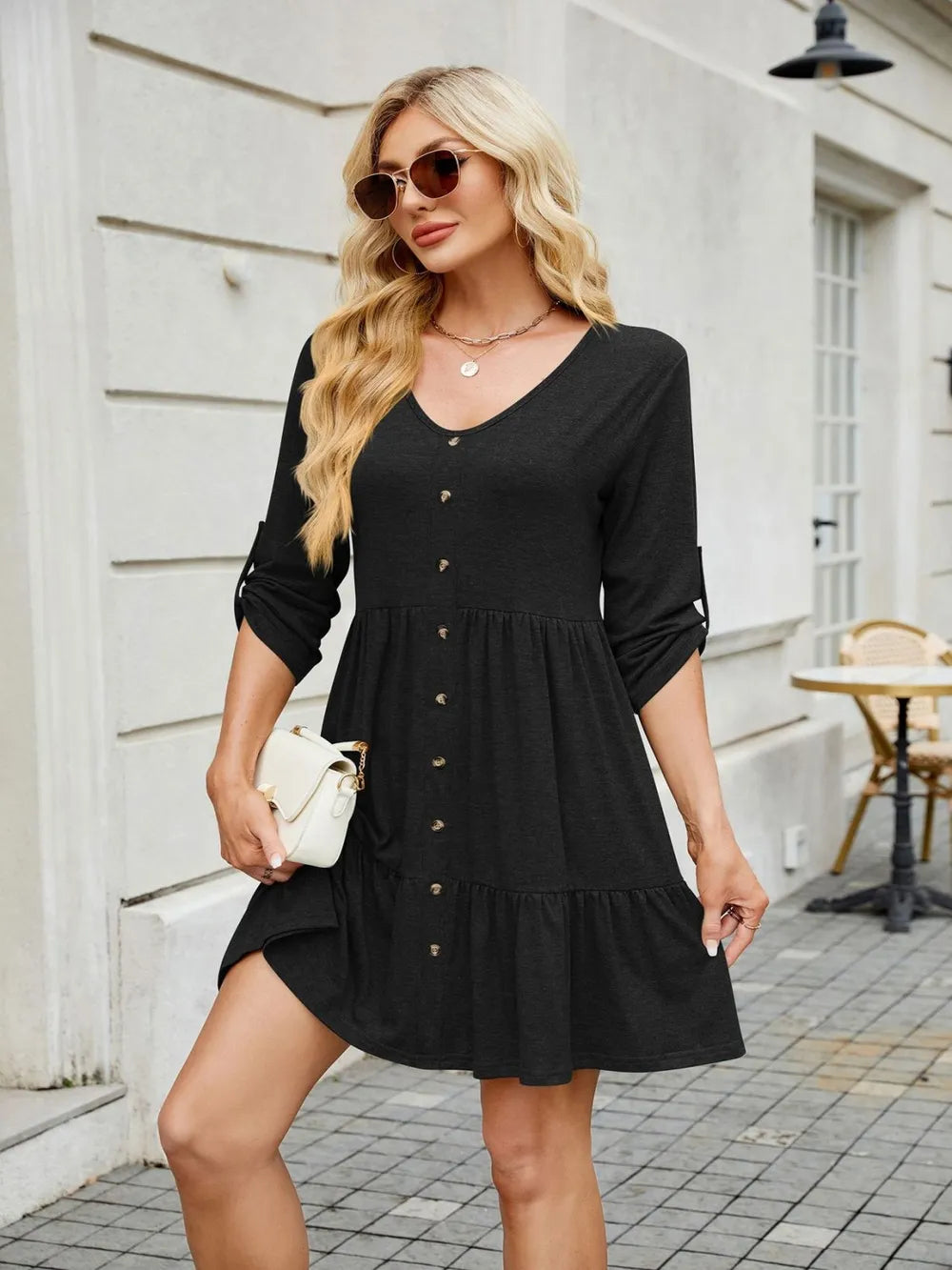 Tiered ruched mini dress styled for evening