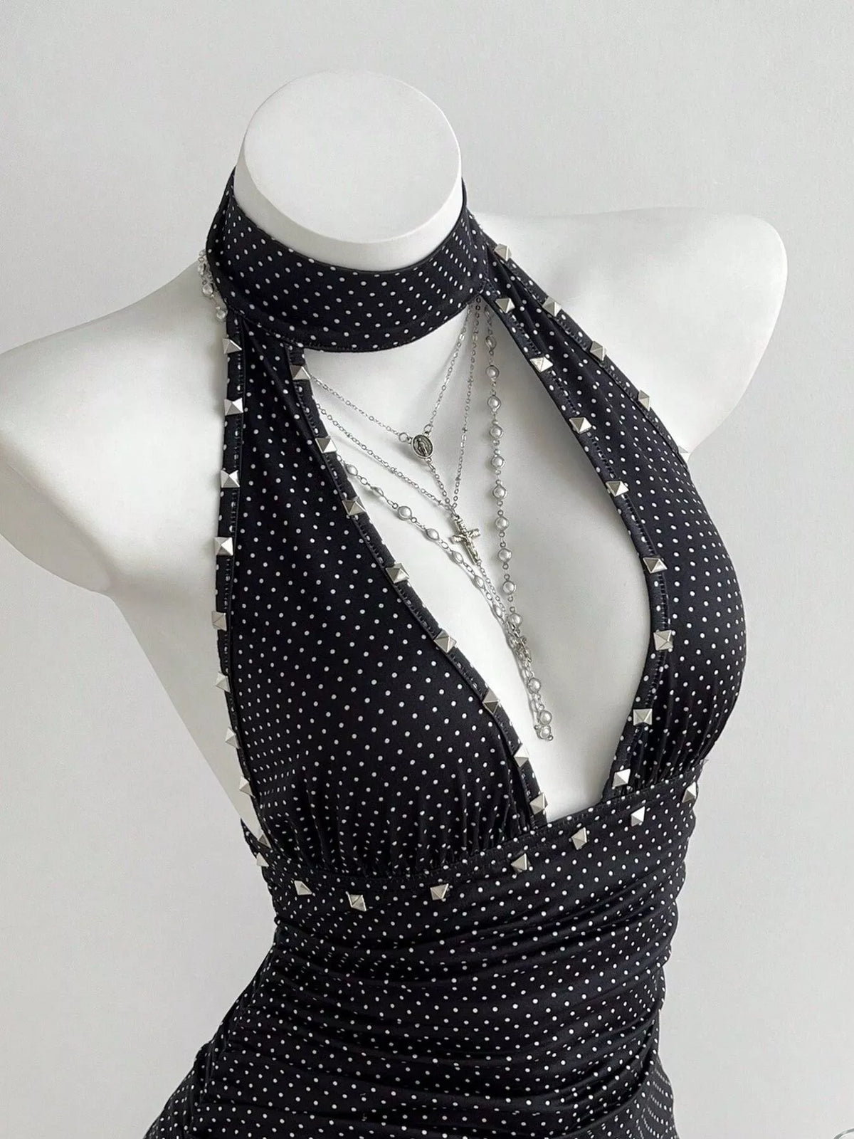 Polka dot halter dress front cutout detail