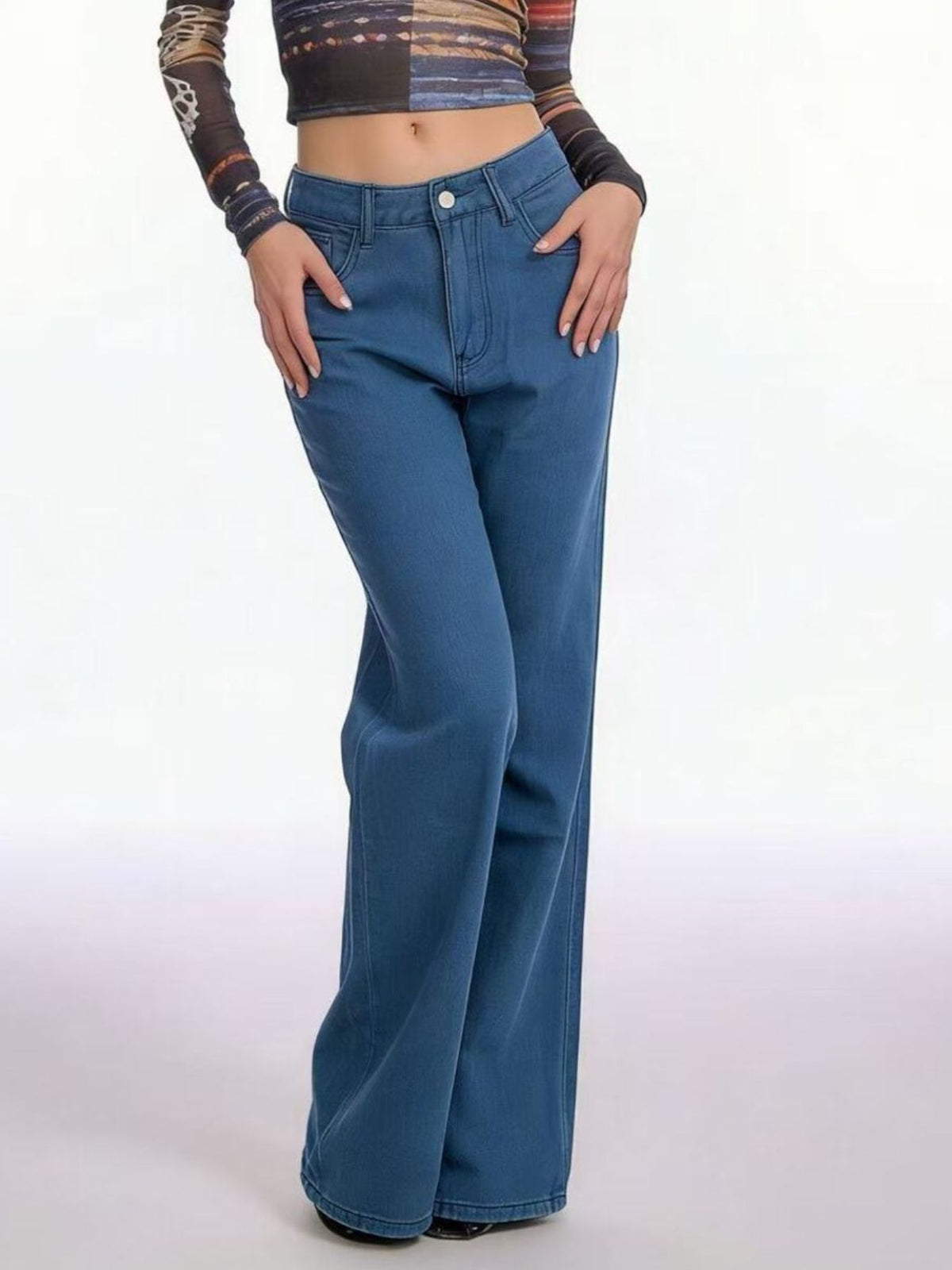 Wide leg denim showing butterfly back pocket detail