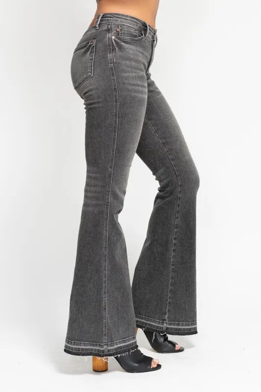 Full length styling of gray flare jeans