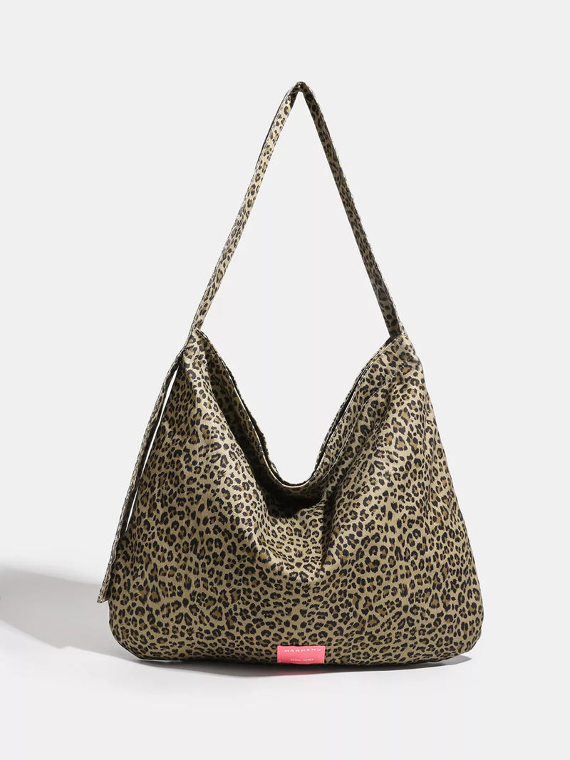 Leopard print canvas shoulder bag front view