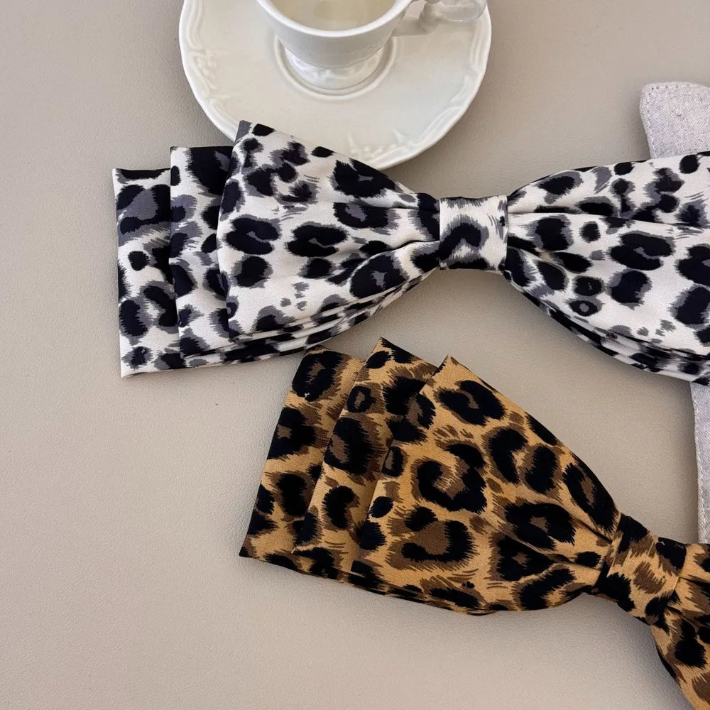 Leopard bow hair clip pair side by side