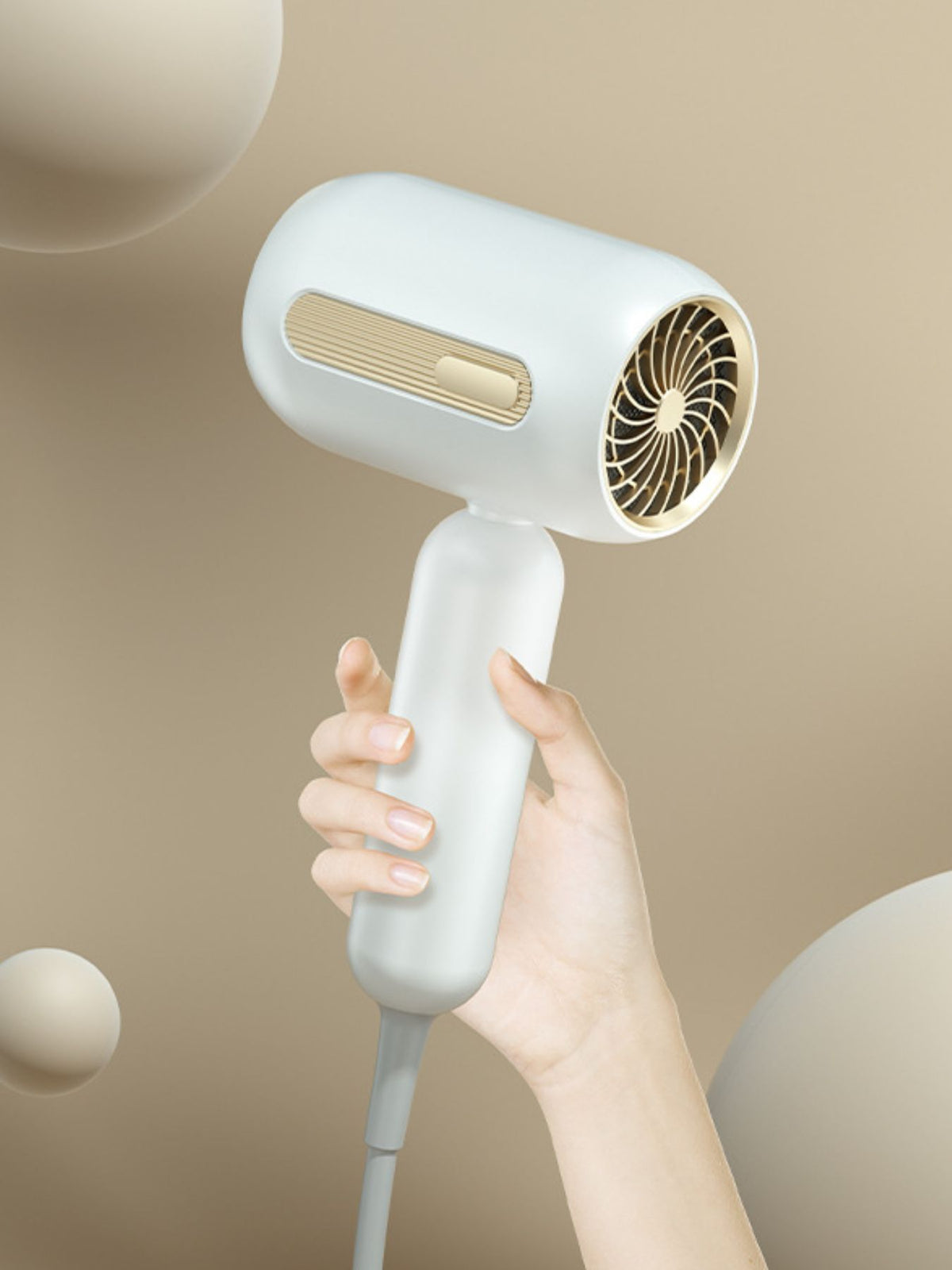 Hair dryer held in hand