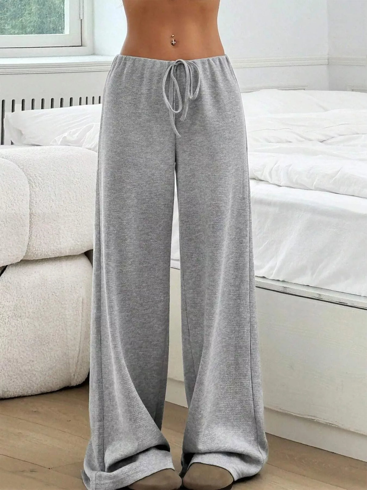 Side drape of the wide leg pants