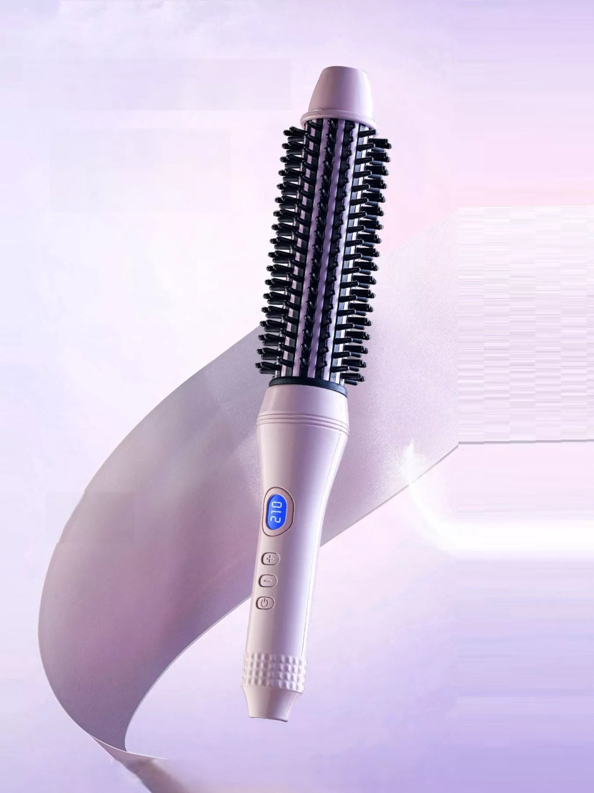 Hot air brush held in hand