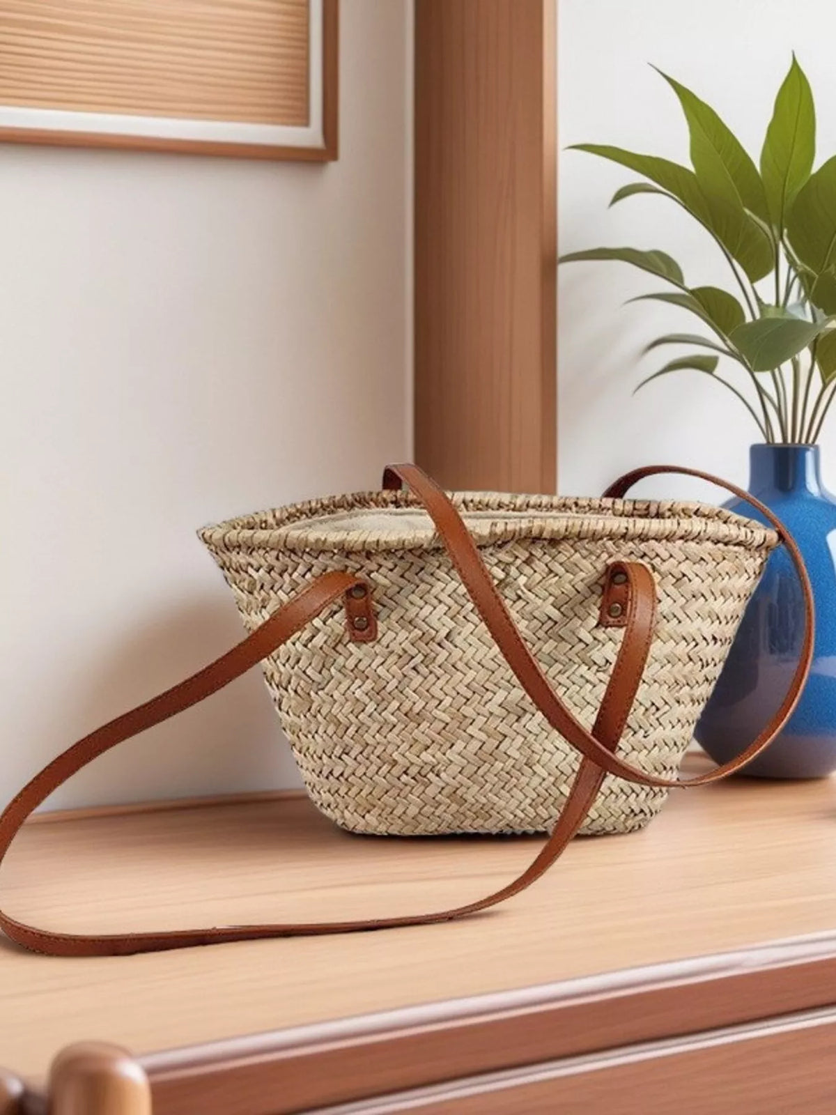 Straw bag with leather trim side view