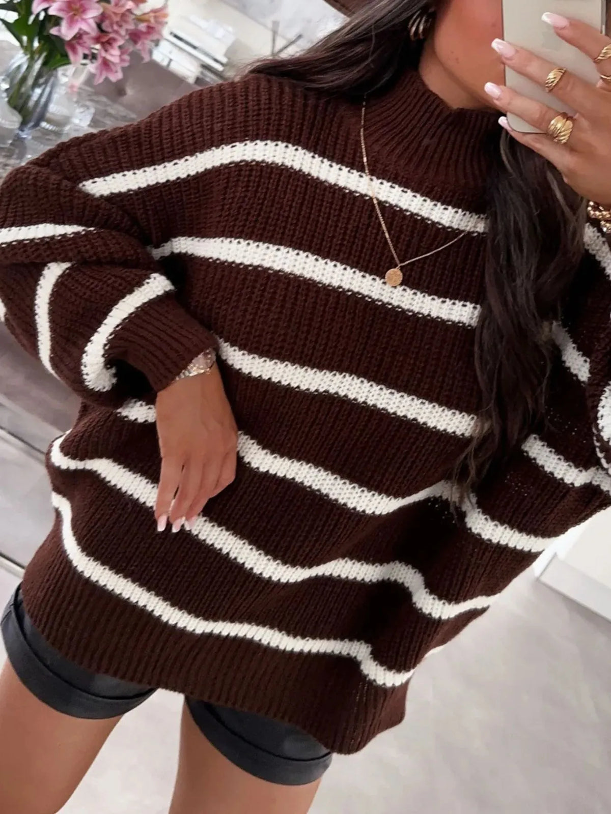 Striped turtleneck sweater side view