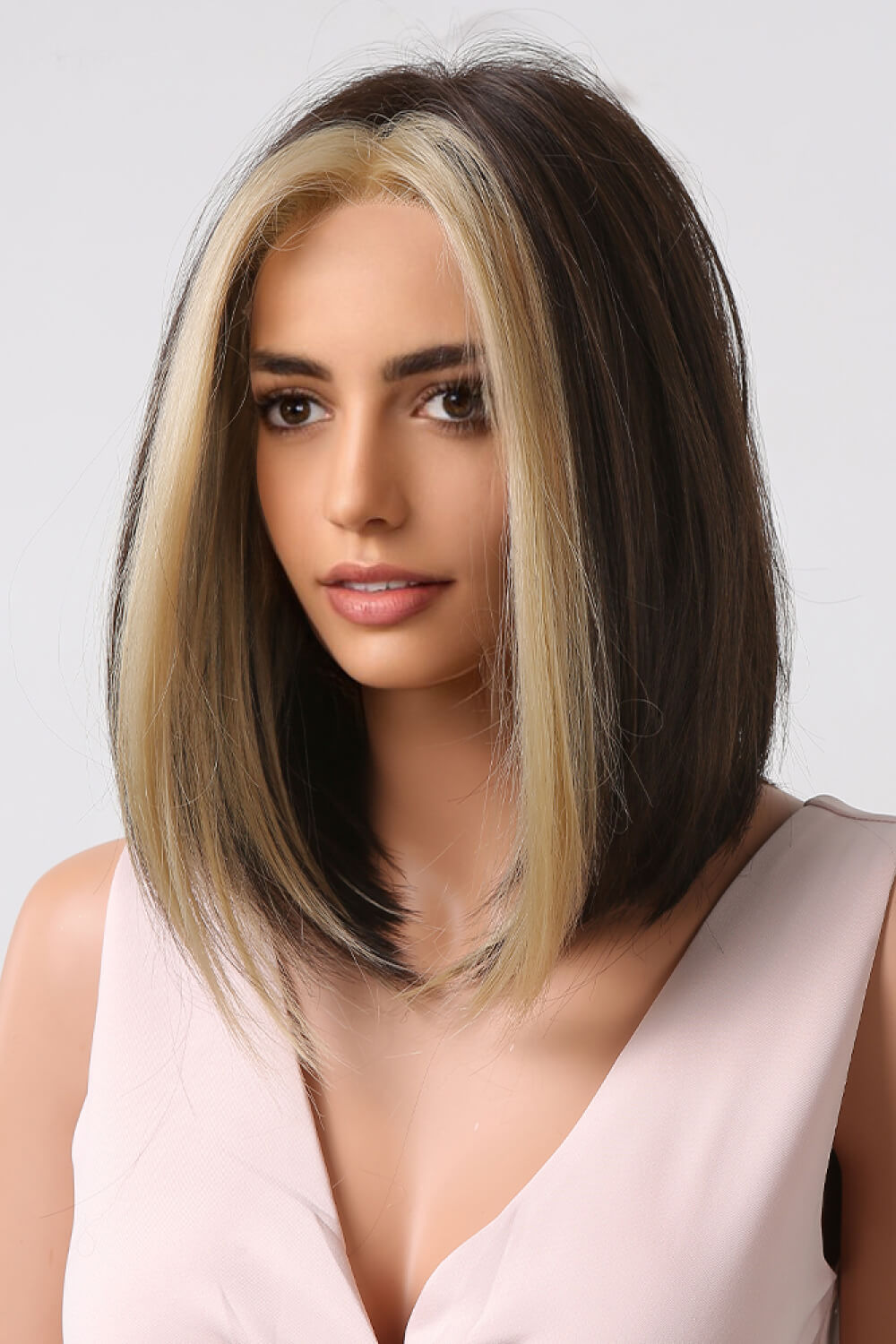 Side view of mid length straight wig