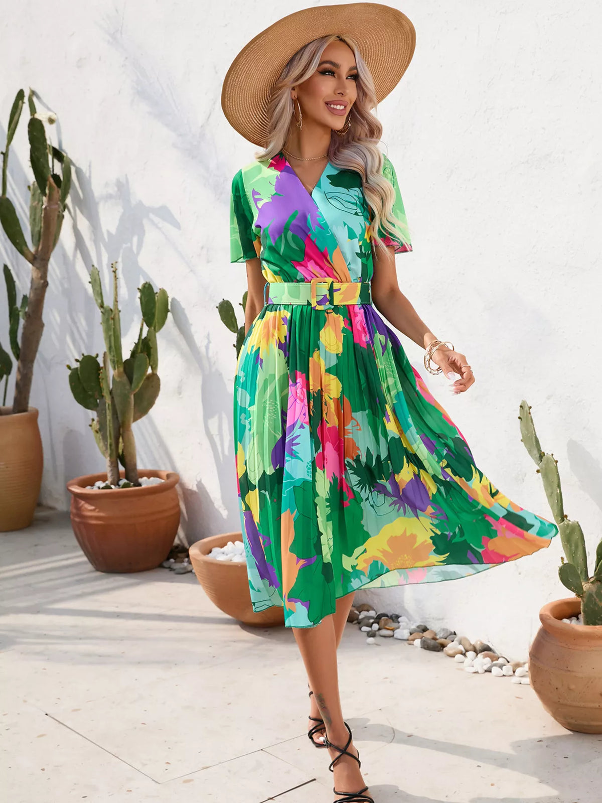 Final styling shot of the tropical print midi dress