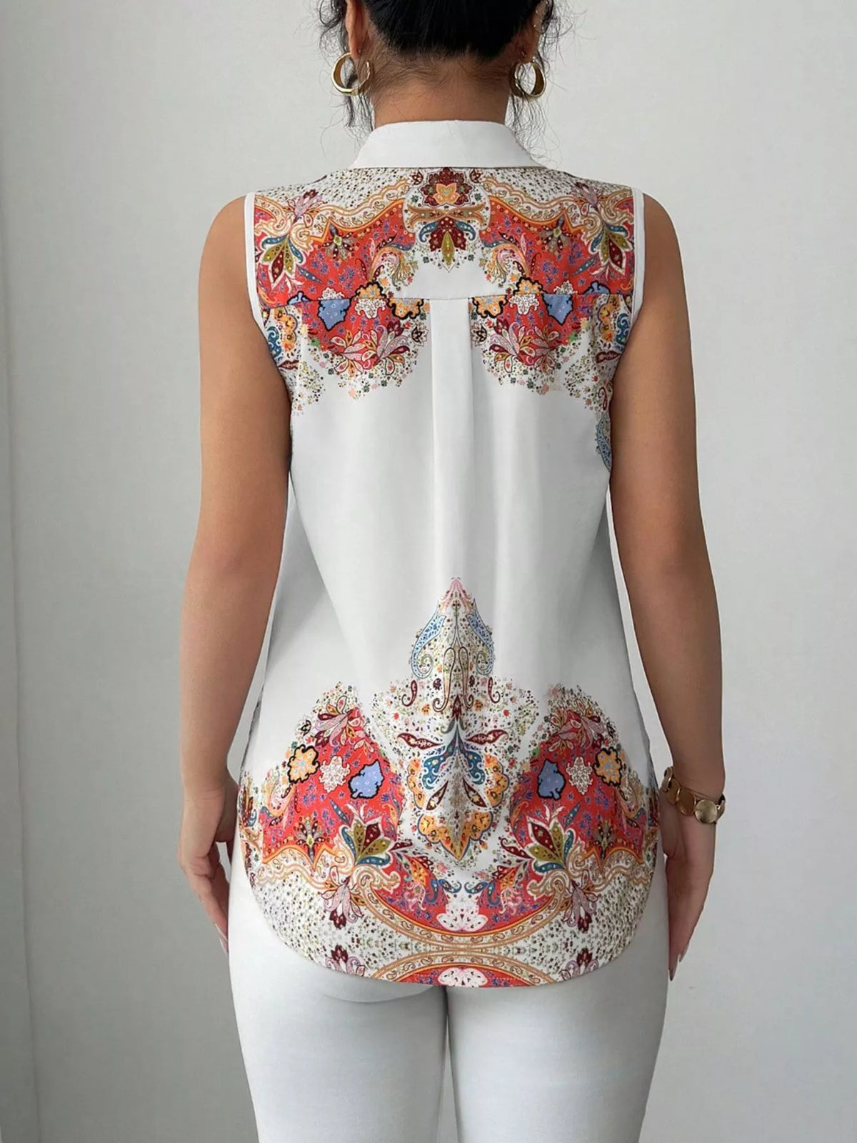 Button up sleeveless shirt shown across the color range