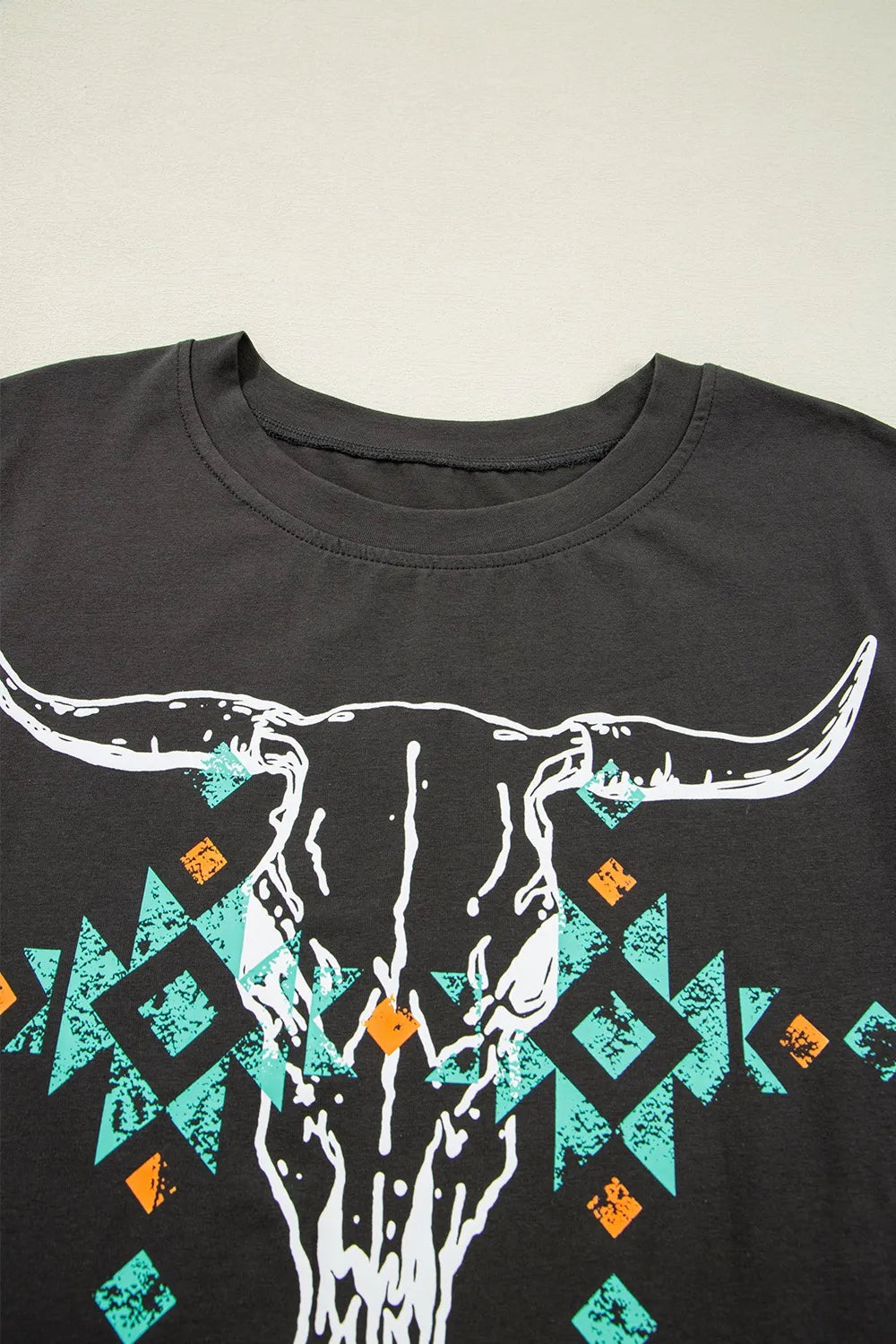 Skull graphic tee neckline detail