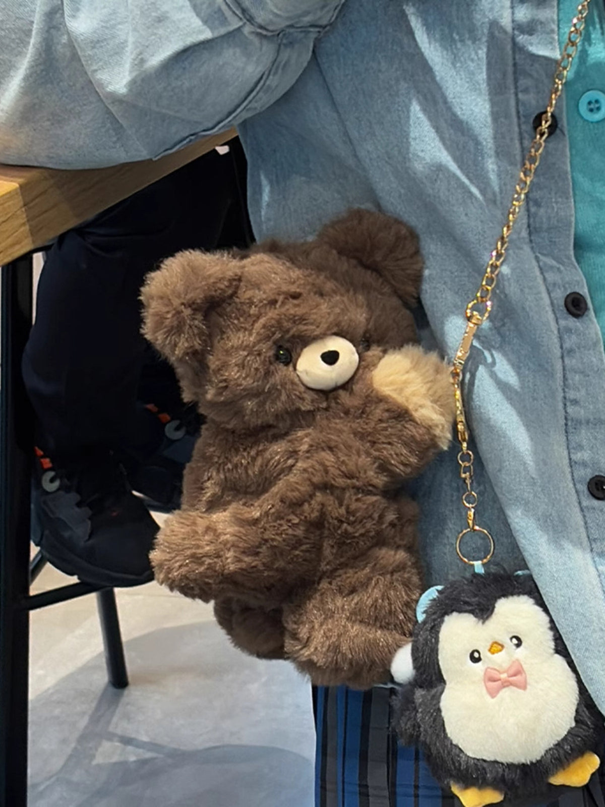 Dark brown plush teddy bear backpack interior compartment