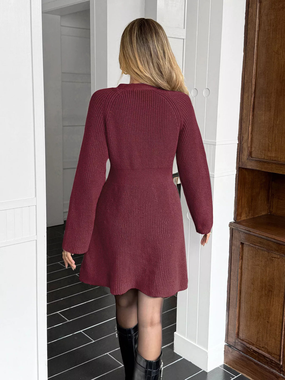 Cozy knitted dress button detail close up