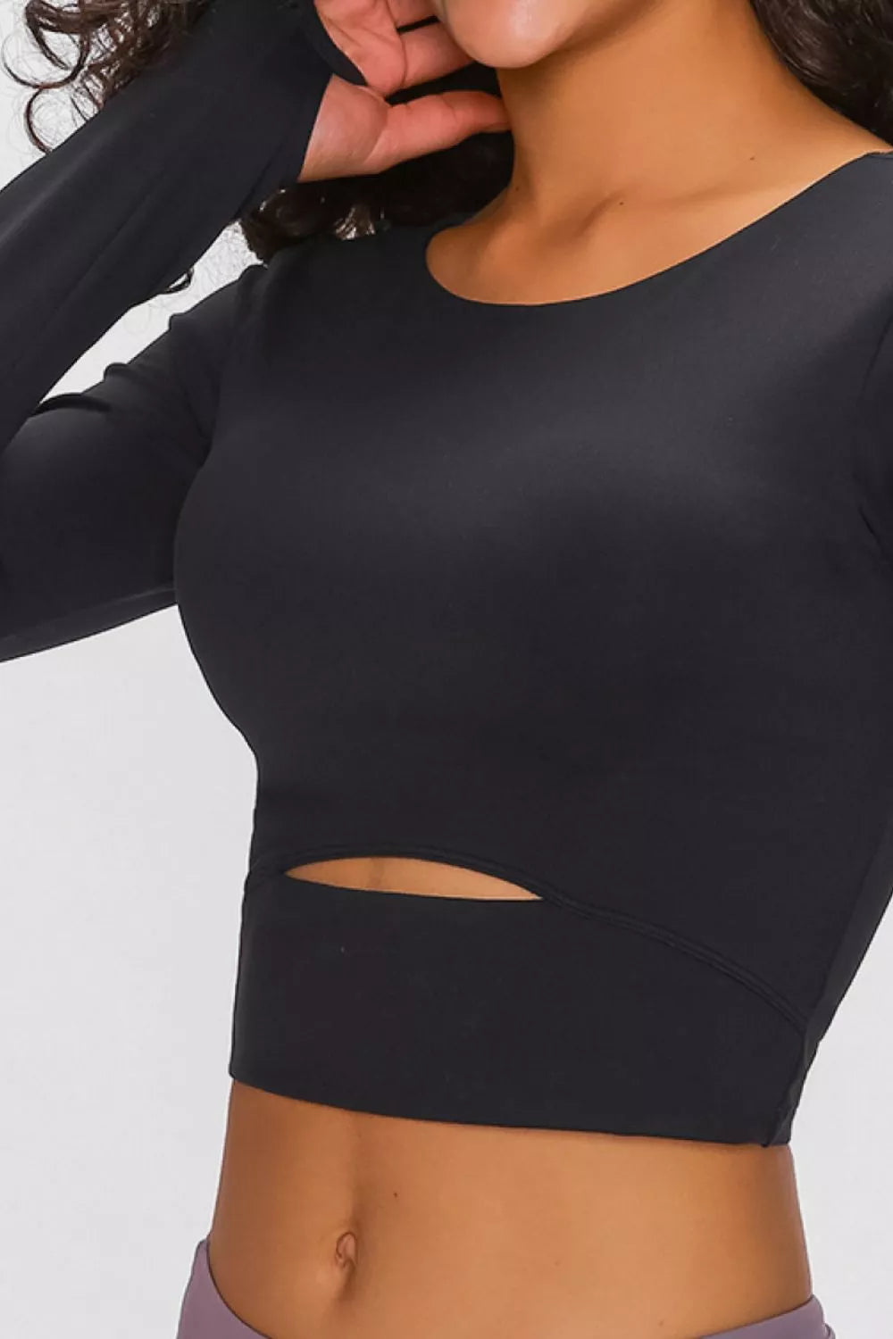 long sleeve cropped active top on model view
