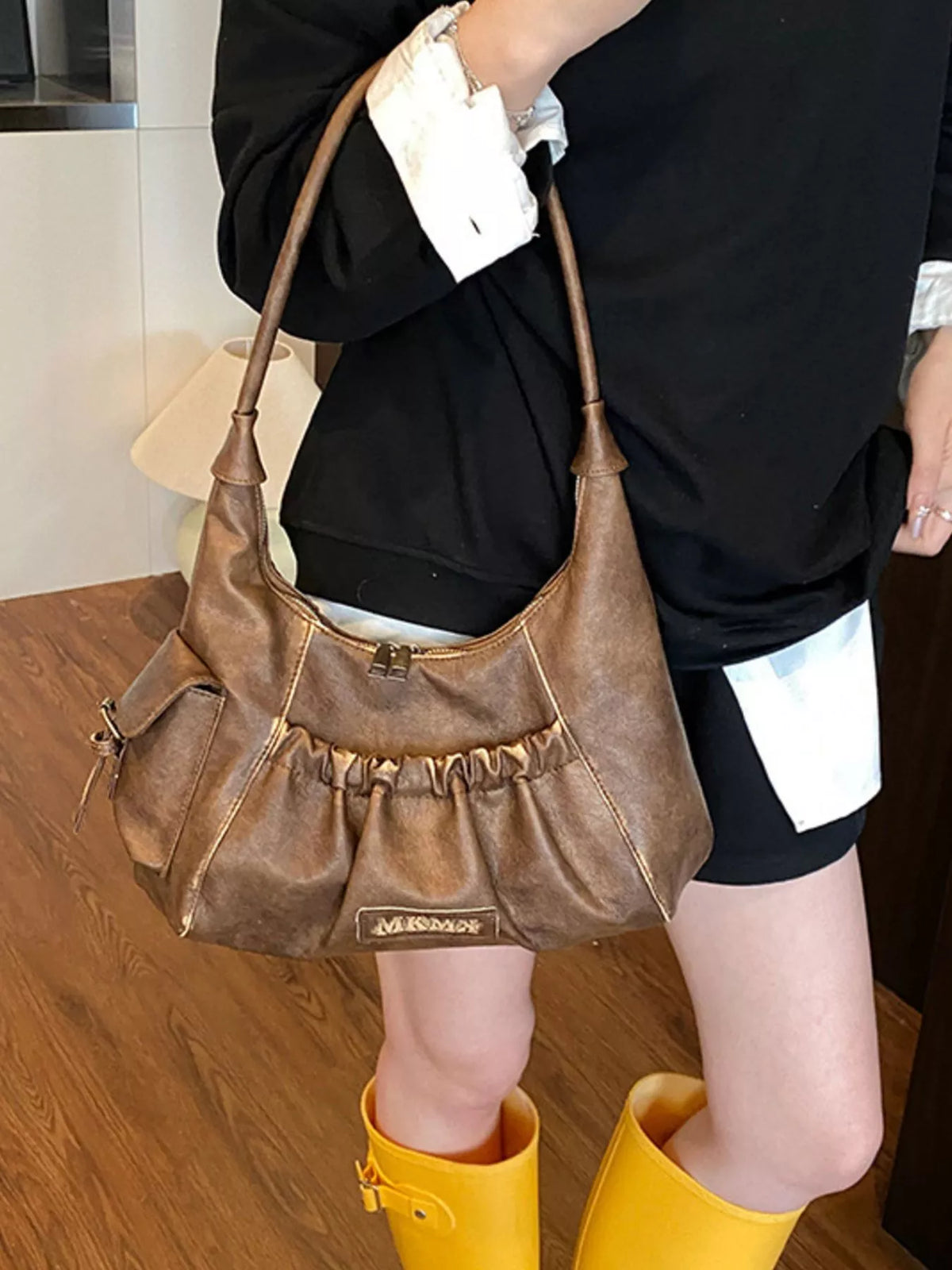 Vintage ruched hobo bag in brown front view