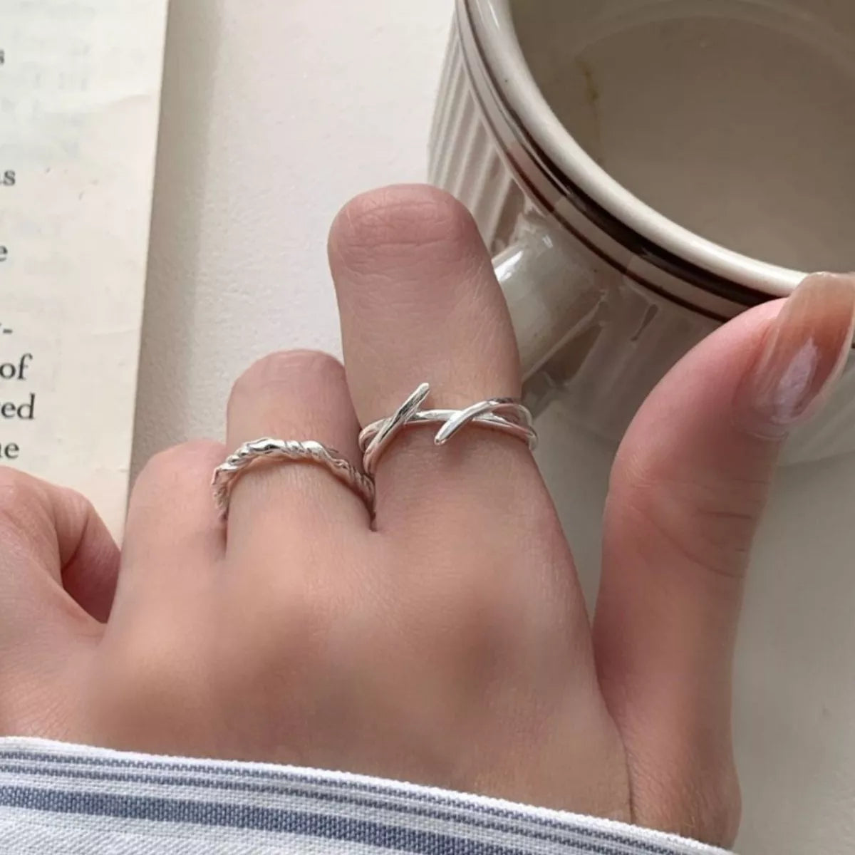 Sterling silver open ring flat lay
