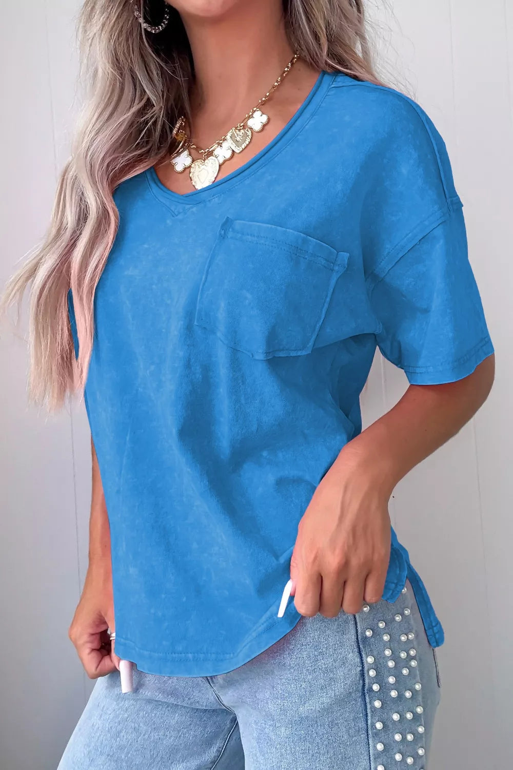 Blue pocketed short sleeve cotton tee front view
