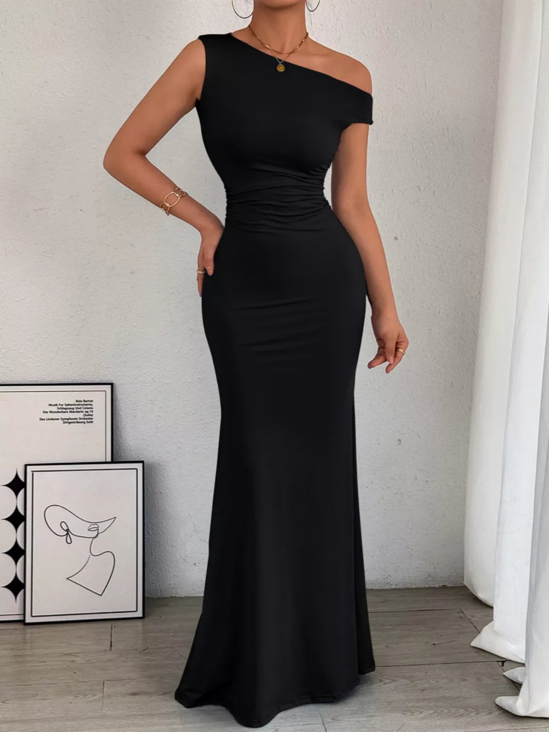 Bodycon maxi dress showing one shoulder neckline