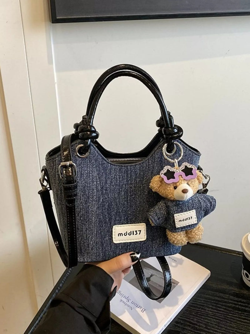 Denim top handle mini shoulder bag front view