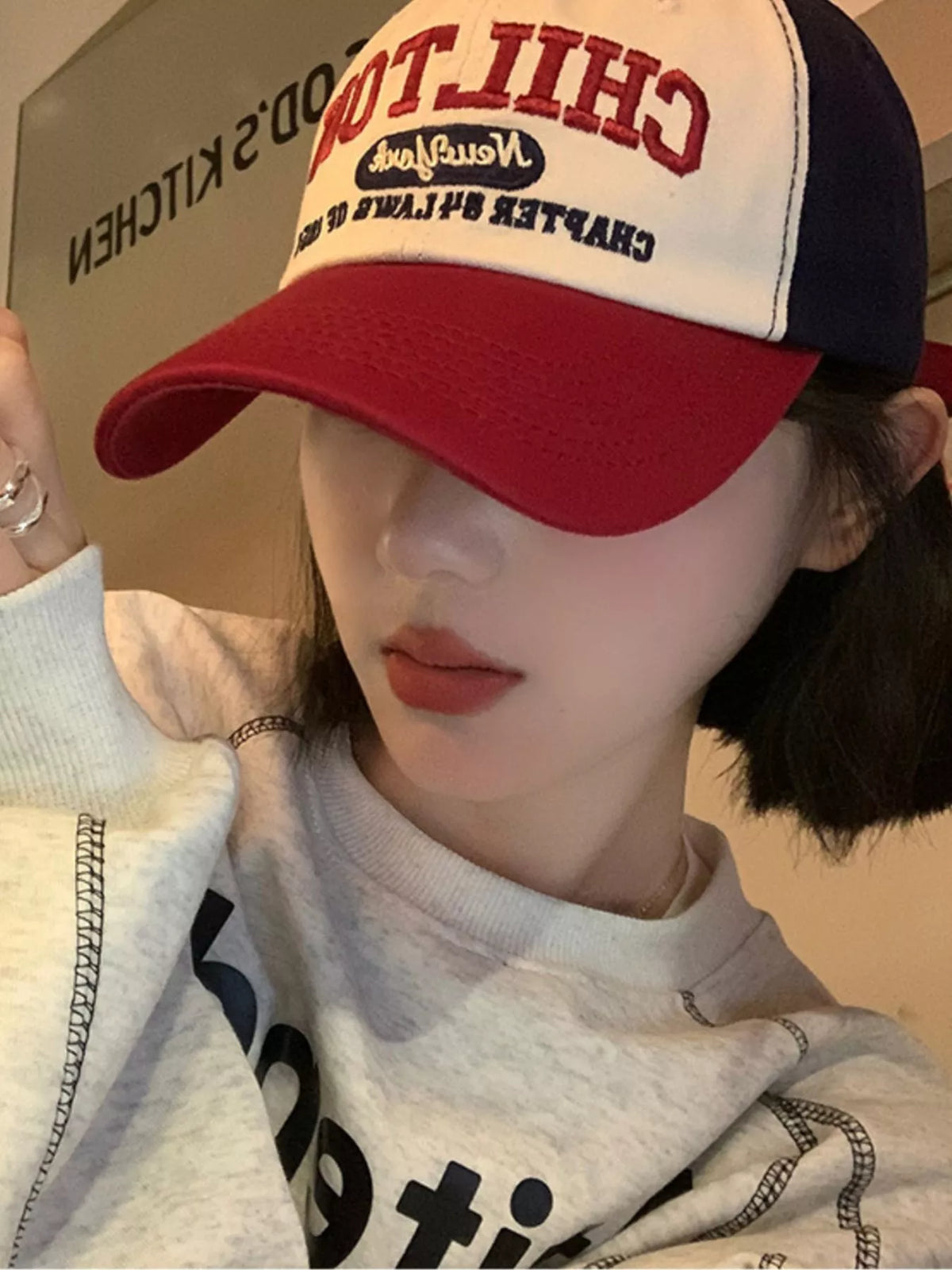 Baseball cap shown from the side showing the crown and brim