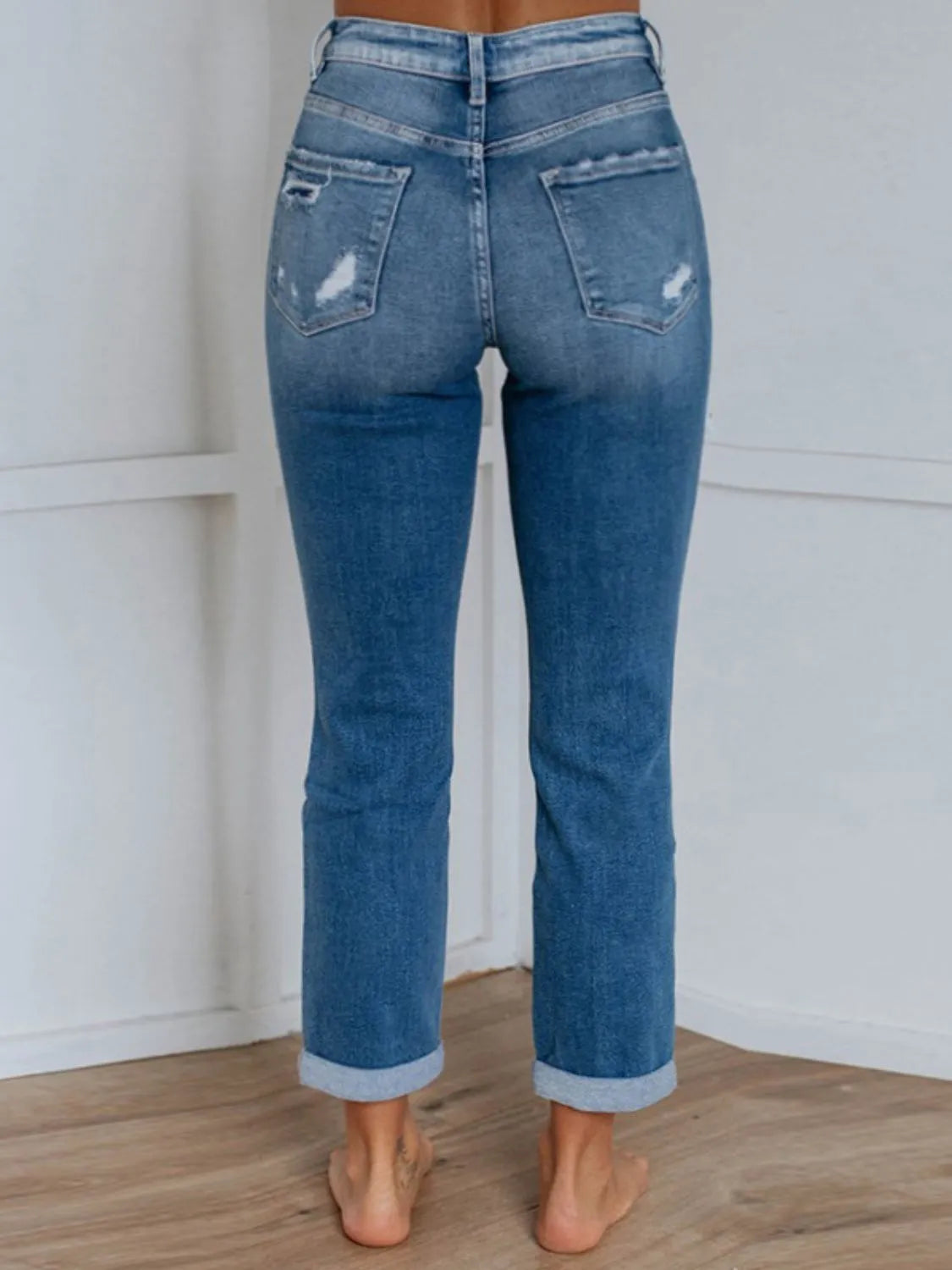Womens straight leg distressed denim back view