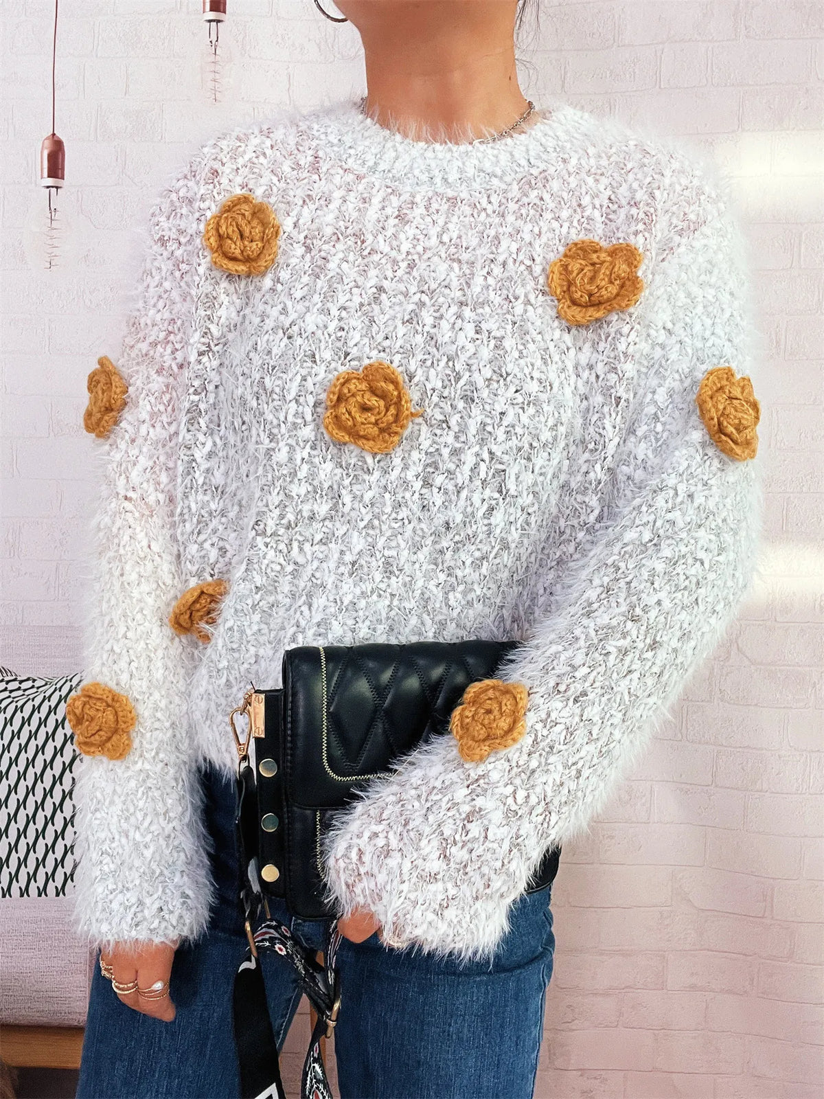 Flower embellished round neck sweater, sleeve and cuff detail