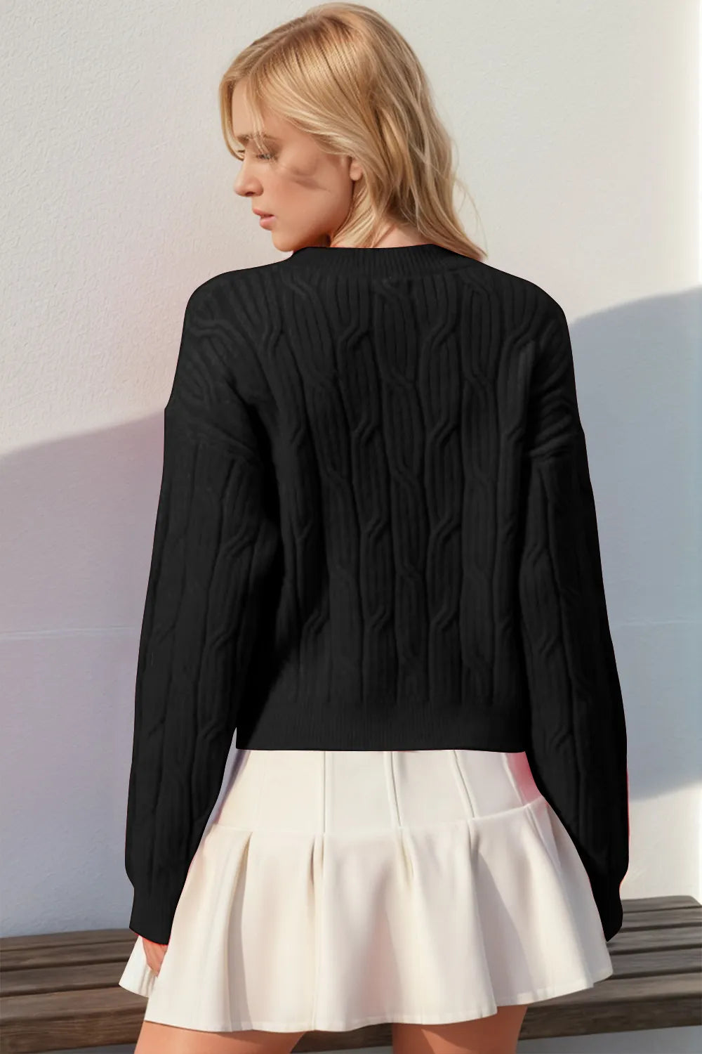 Cozy bow cable knit sweater styled back view