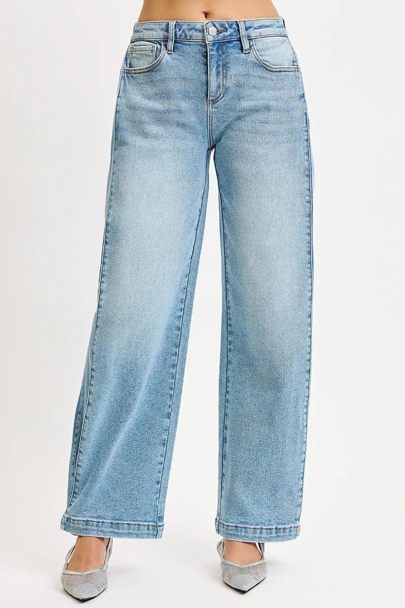 RISEN mid rise wide barrel snap hem jeans front view in blue wash