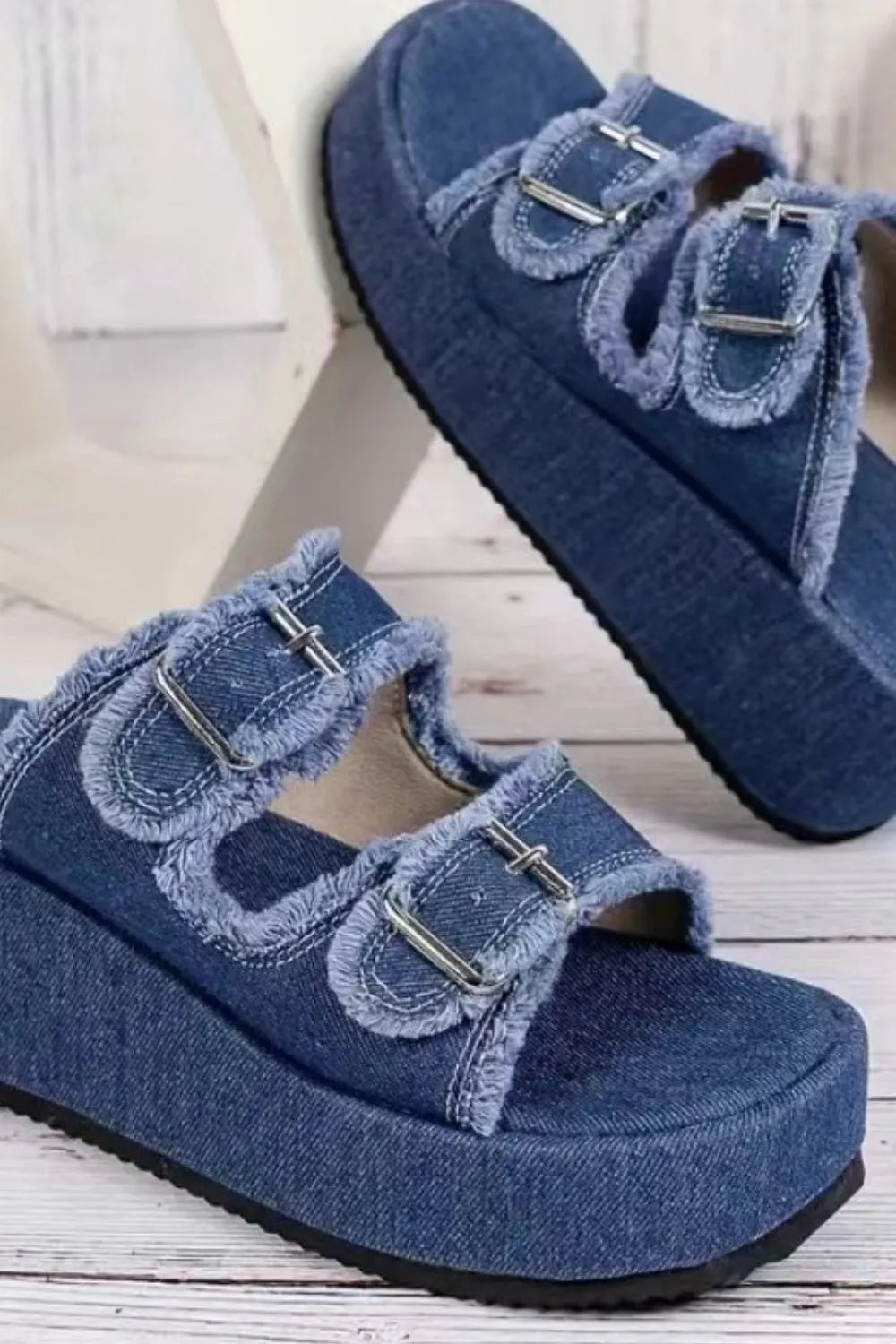 Raw hem wedge buckle sandals side view