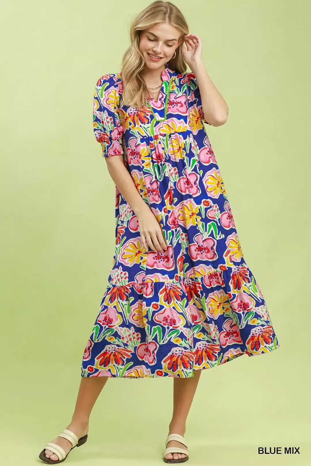 Blue floral puff sleeve tiered midi dress side view