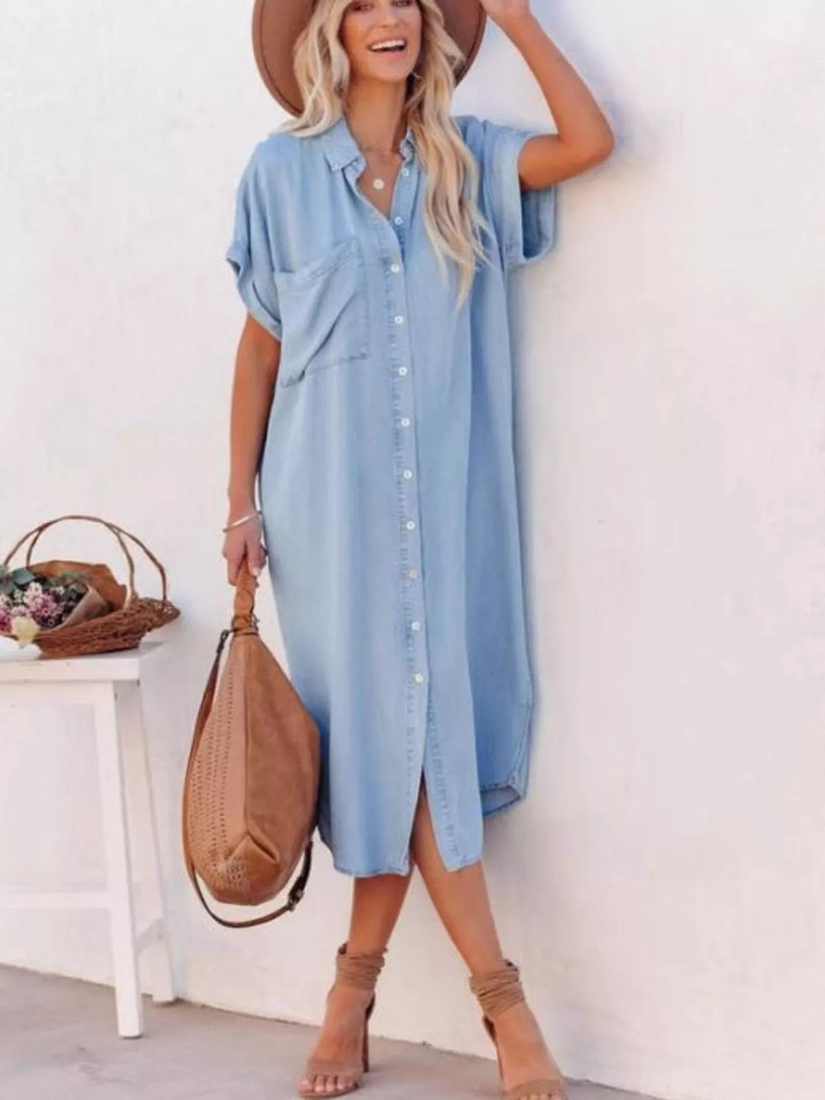 Light blue button front collared shirt dress with side slits front view
