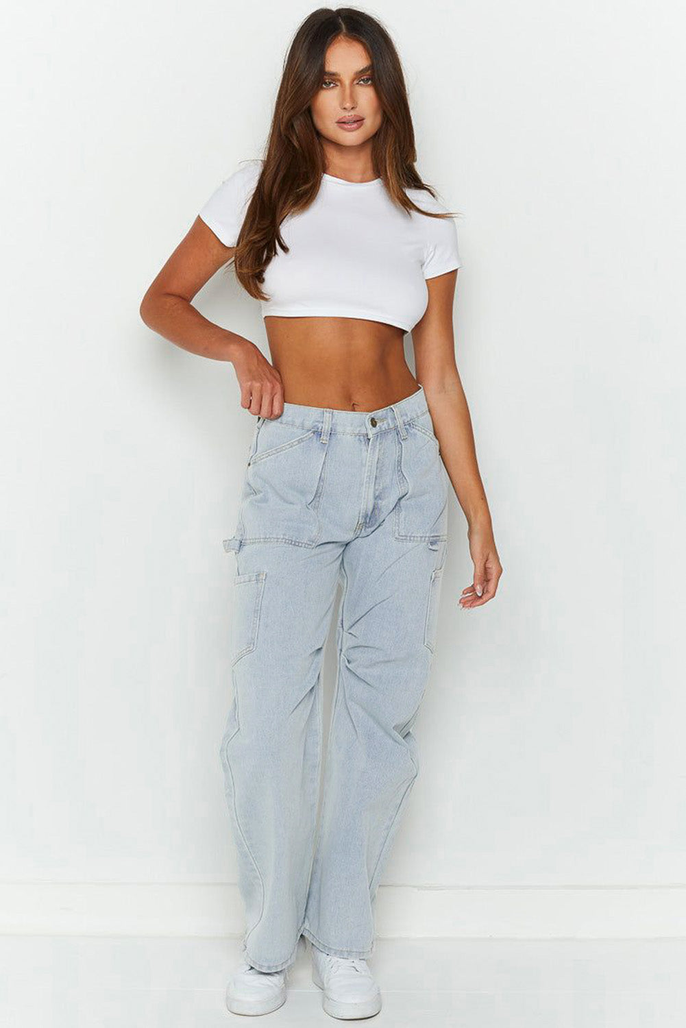 Blue denim cargo jeans waist and pocket detail