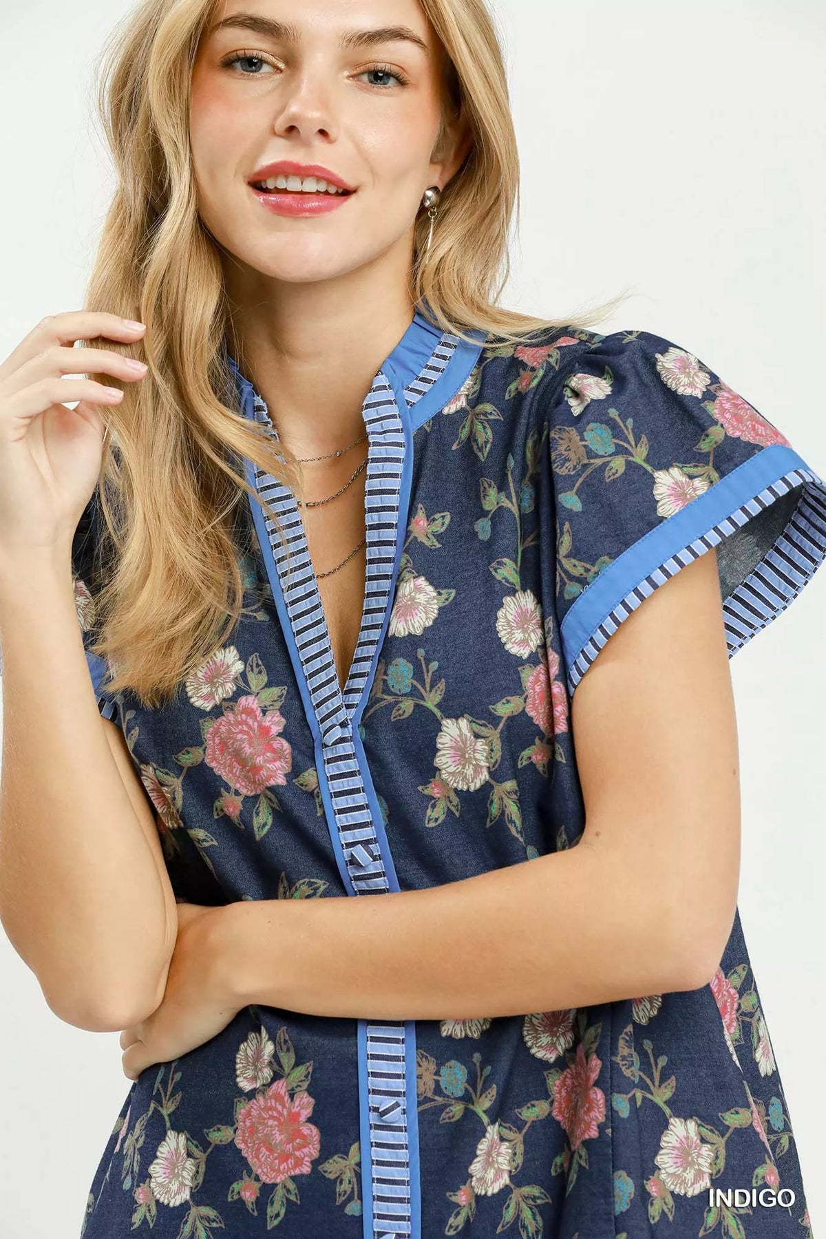 Indigo floral mini dress contrast trim hem detail