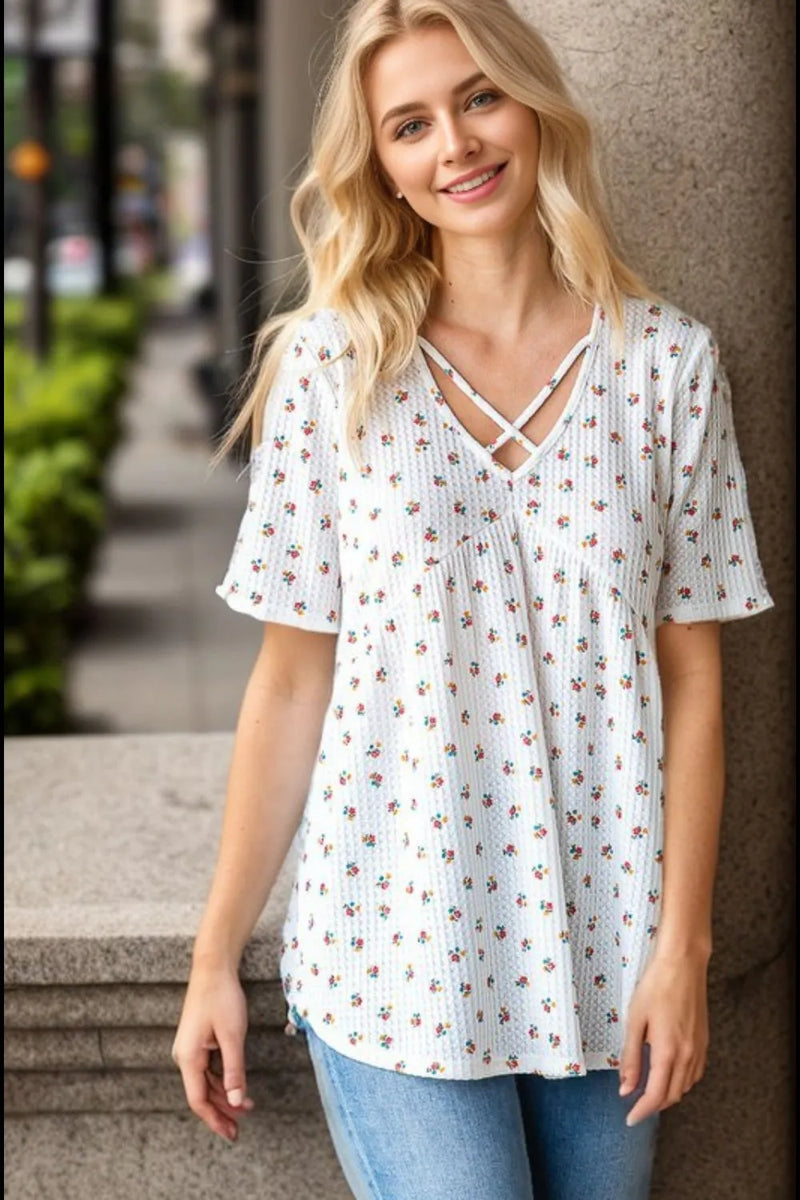 Crisscross ditsy floral babydoll top front
