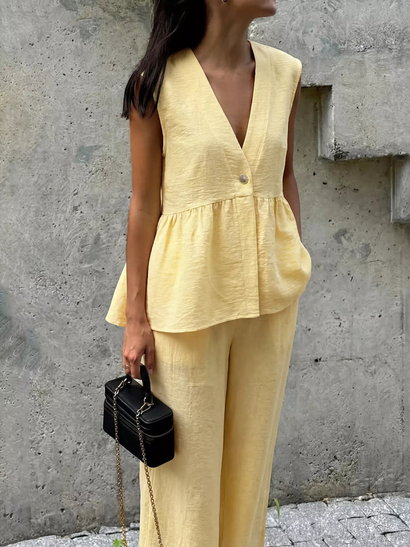 Yellow one button sleeveless top and pants two piece set front view
