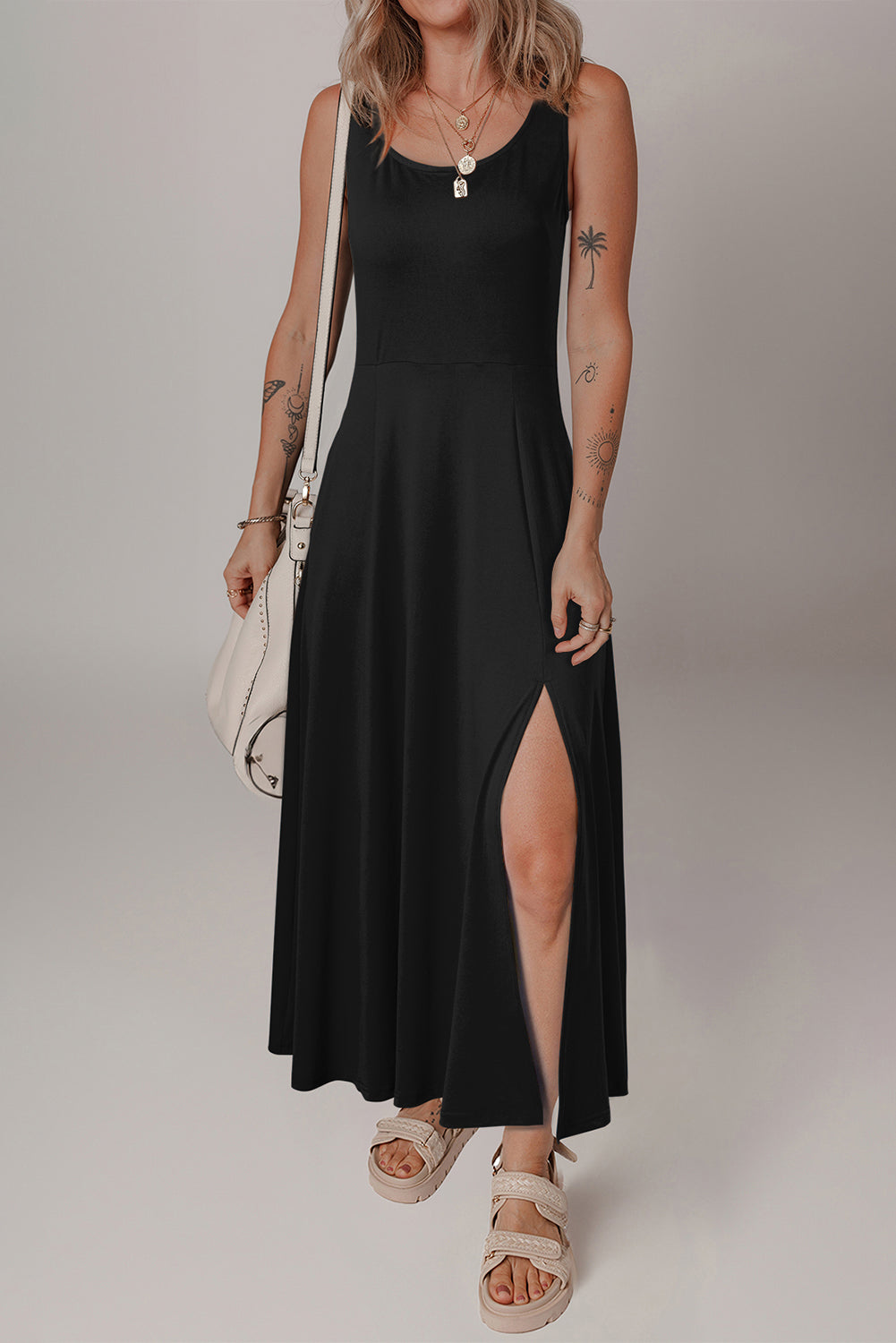 Casual black midi dress detail of split hem