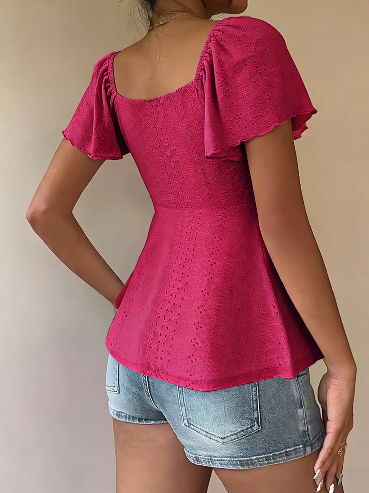 Summer top styled with high waist jeans