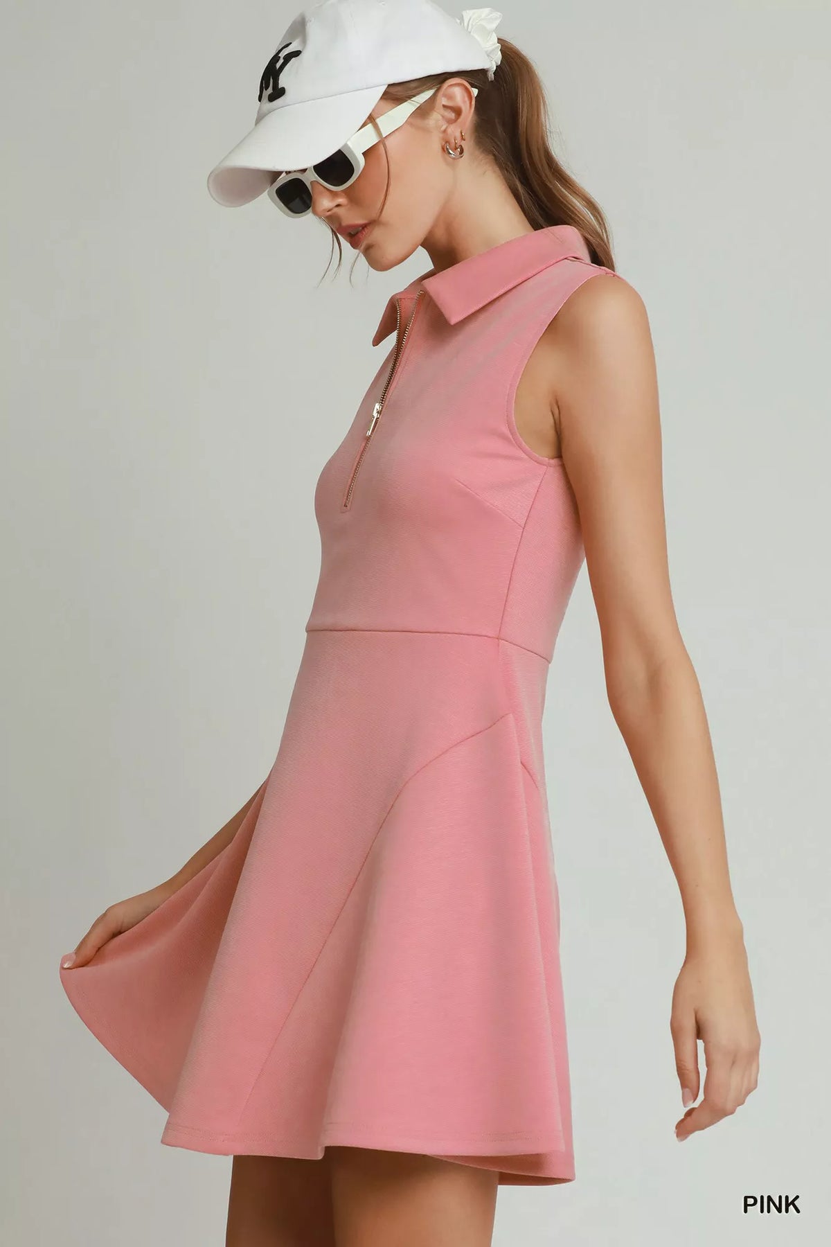 Pink collared quarter zip tennis dress back view