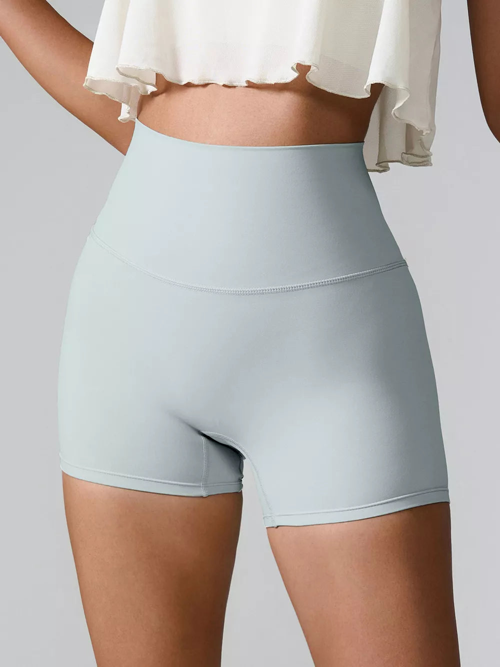 High waist pocket active shorts hem detail