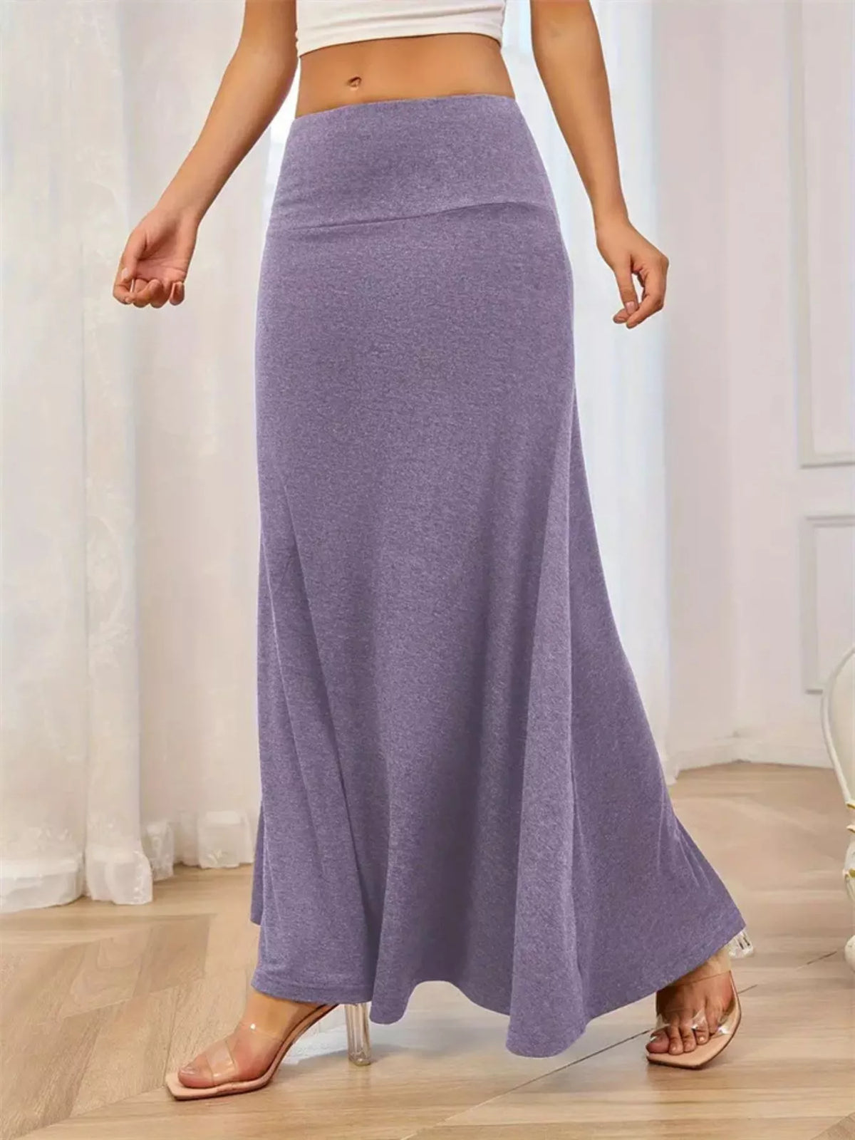Long flowy skirt with wide waistband, side profile