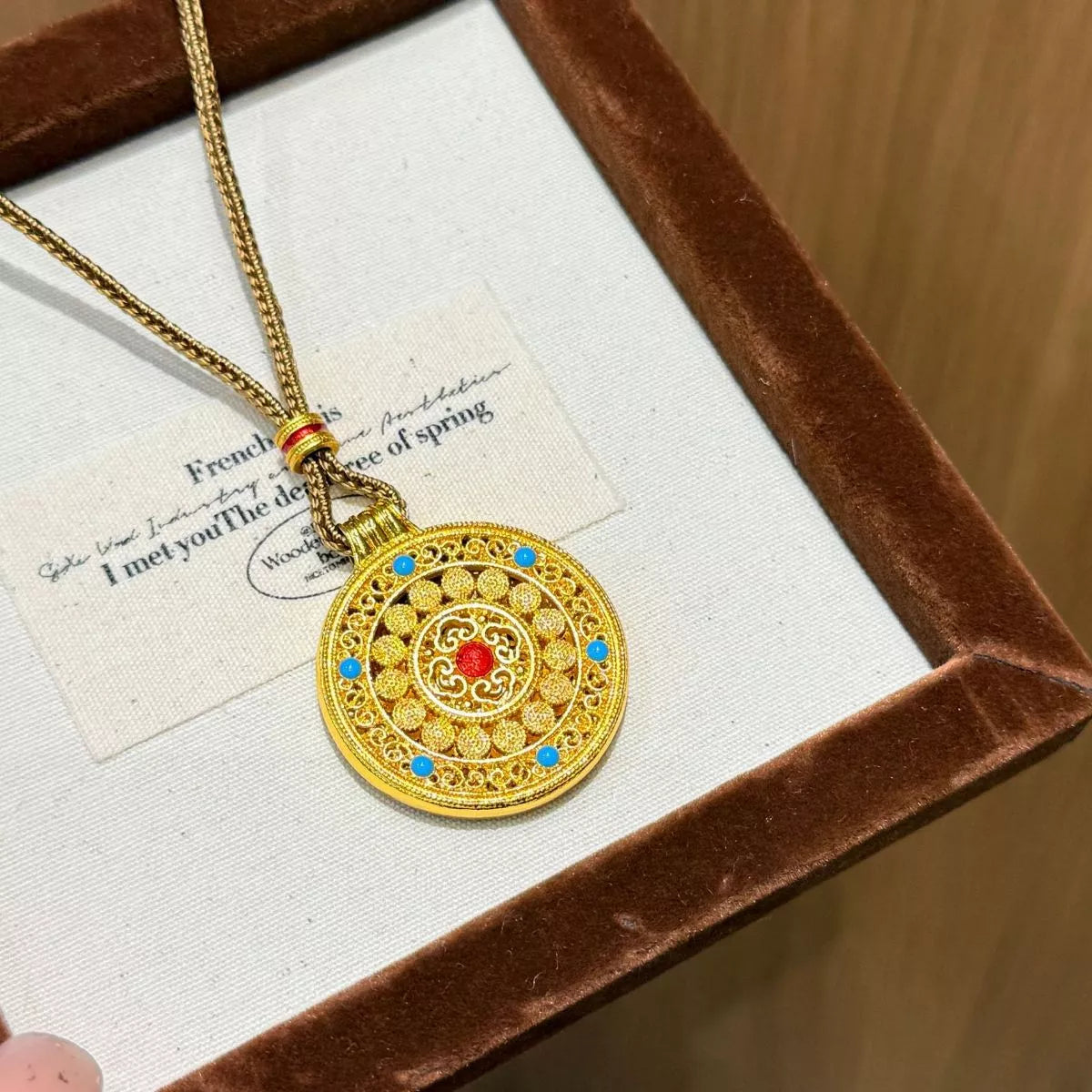Gold plated round pendant necklace front view