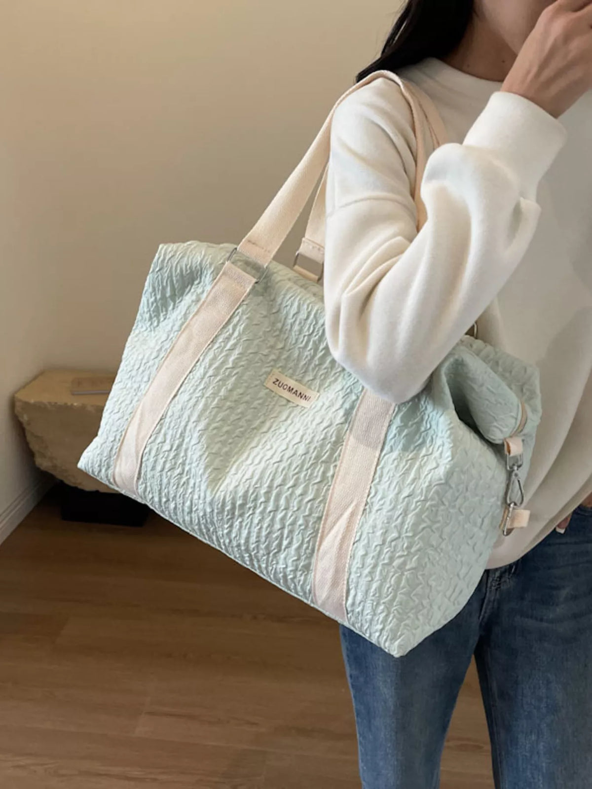 Matcha green textured travel duffel bag front view